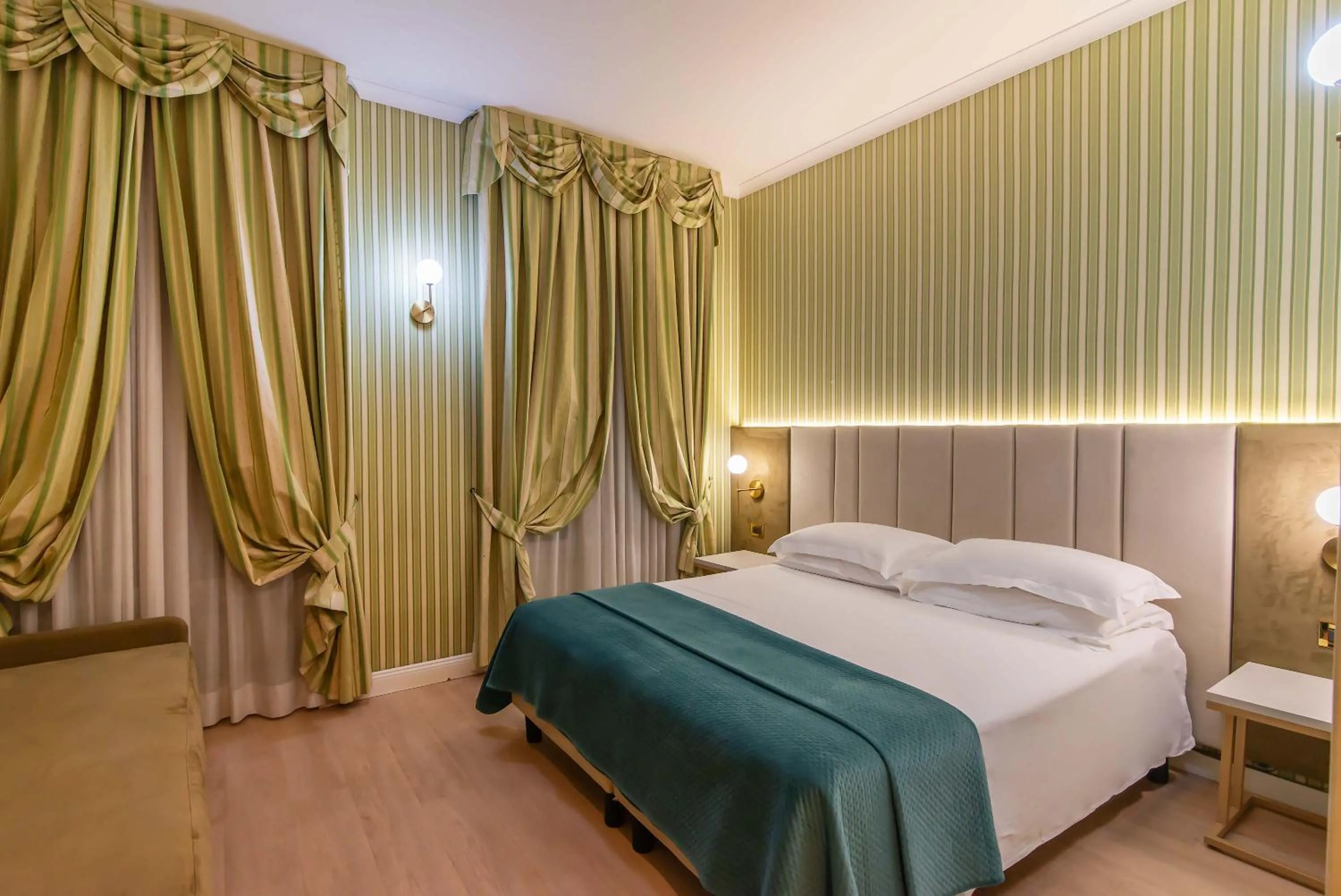 Bed in Gambrinus Hotel