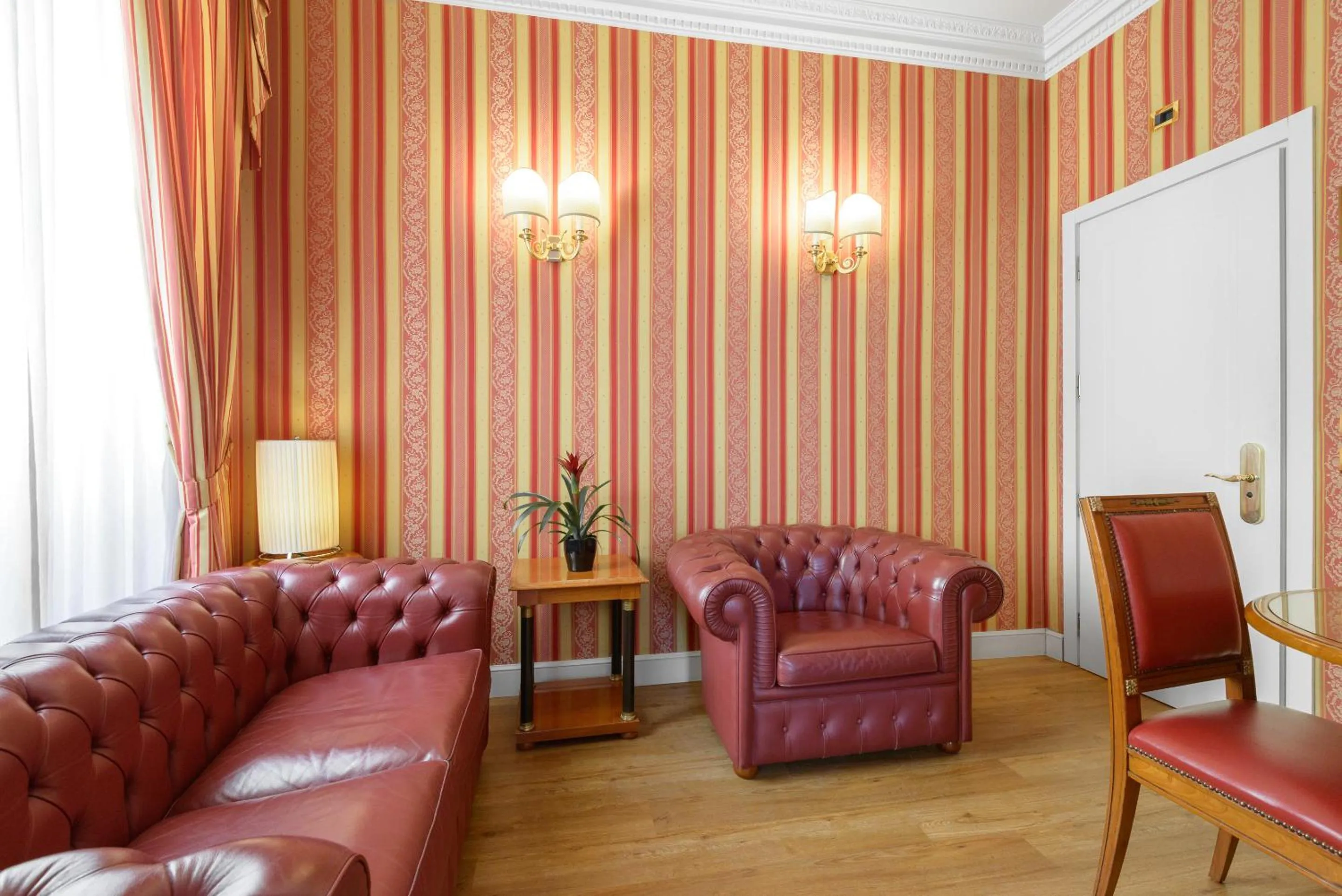 Seating area in Gambrinus Hotel