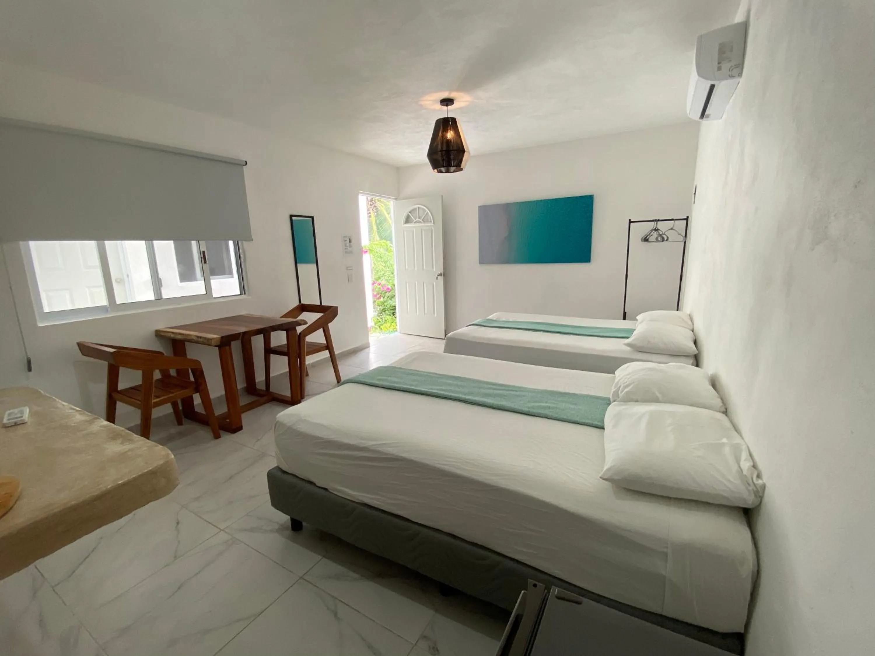 Bed in Casa Colibrí El Cuyo