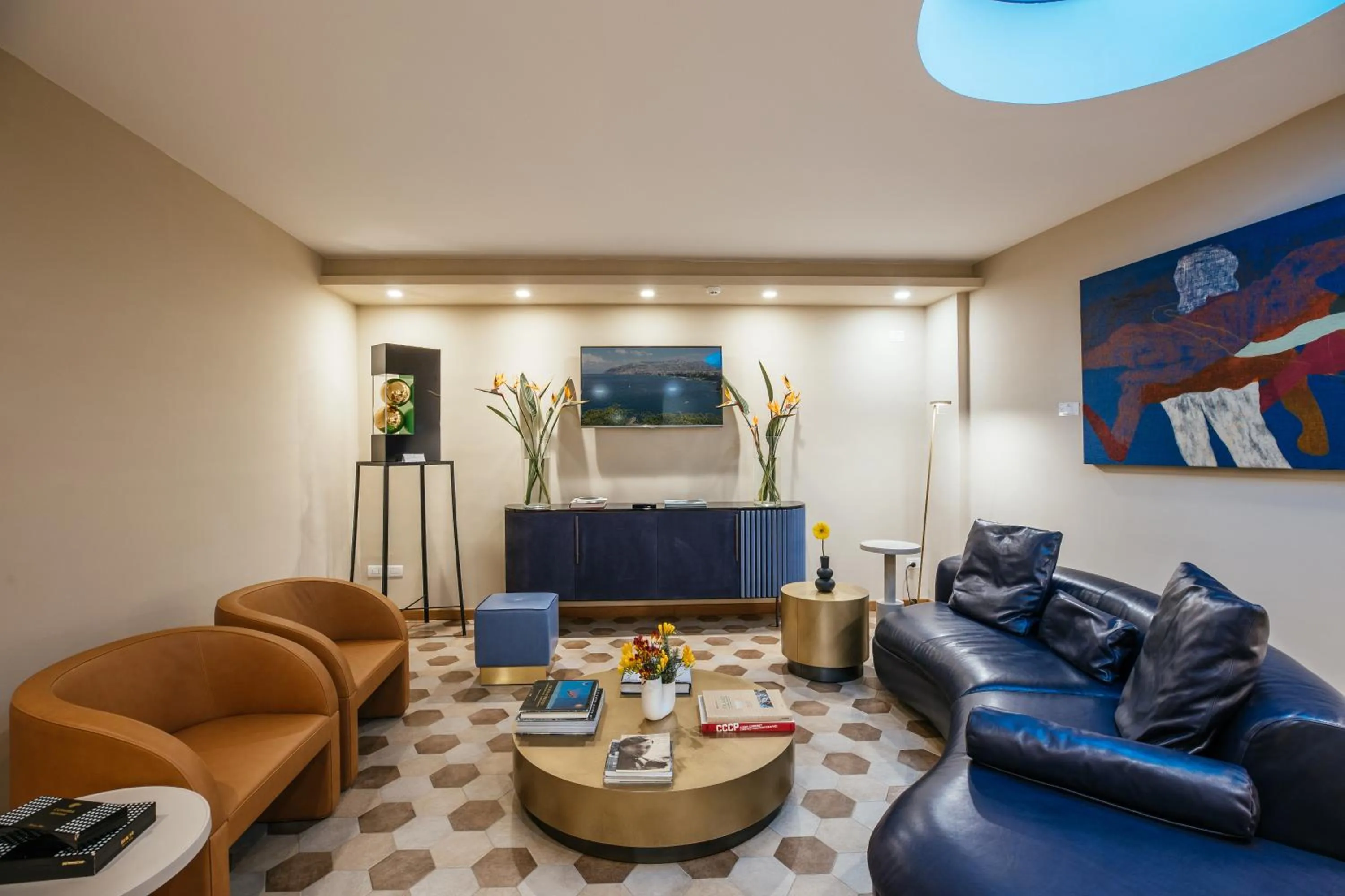 Communal lounge/ TV room in Villa Fiorella Art Hotel