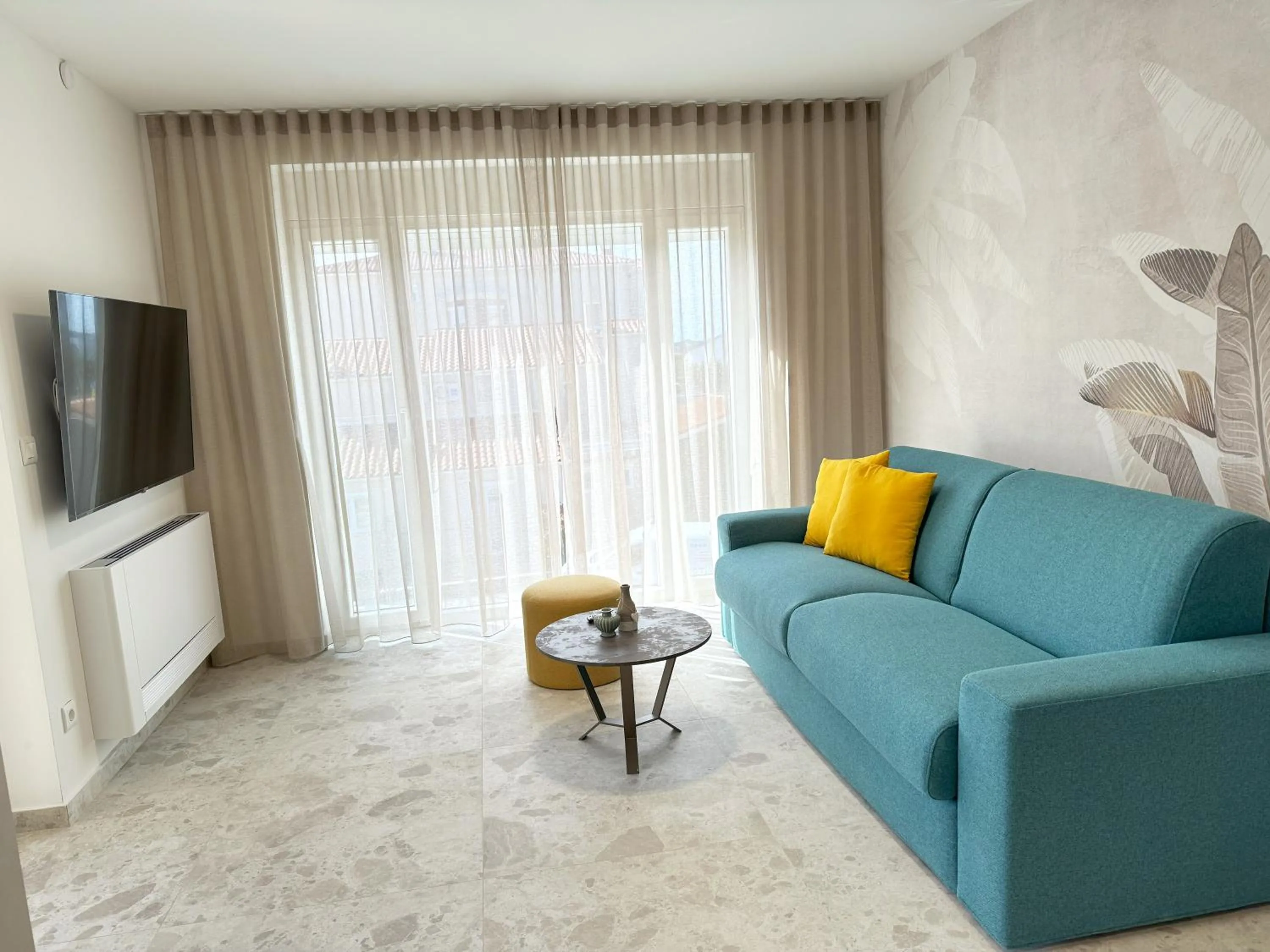 Communal lounge/ TV room in Apartments Villa Nina