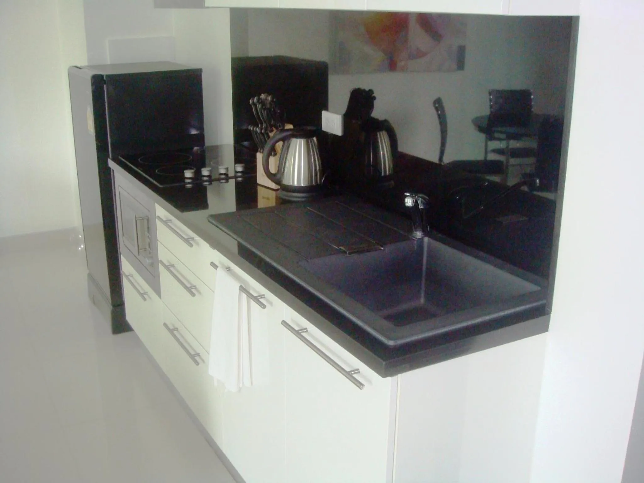 Kitchen or kitchenette in Siam Palm Residence