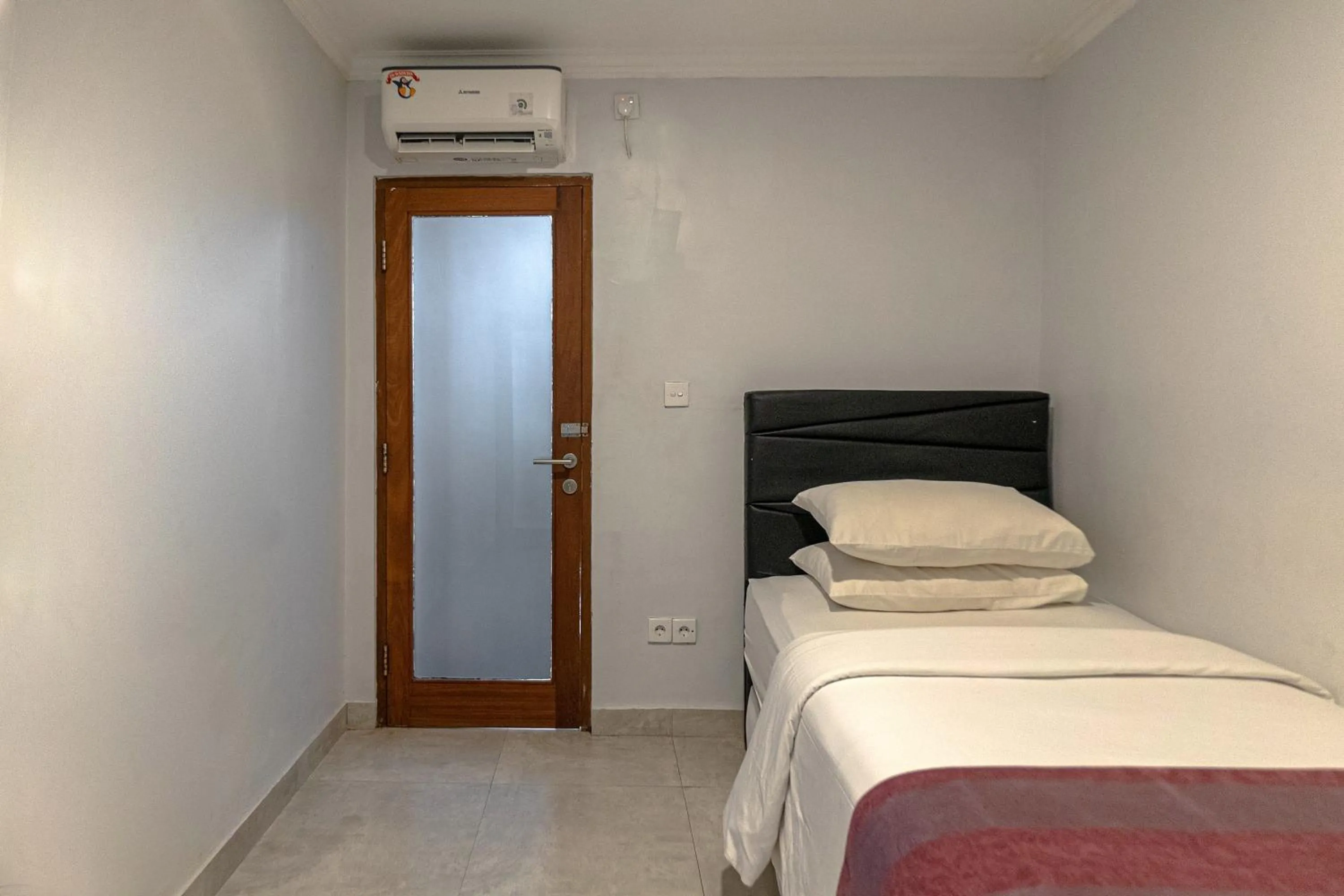 Bed in Ayuna Suites Canggu