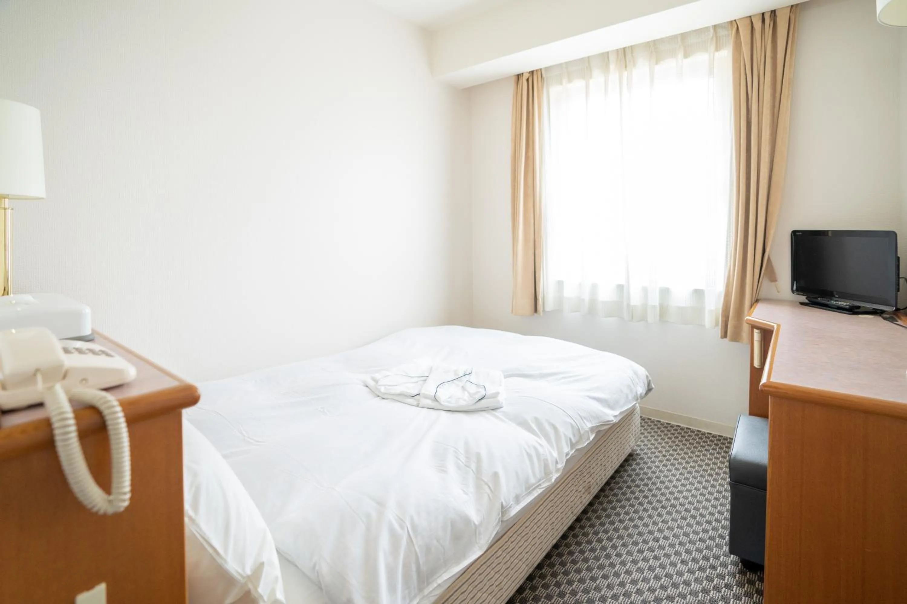 Photo of the whole room, Bed in Hotel Casabella Inn Kobe