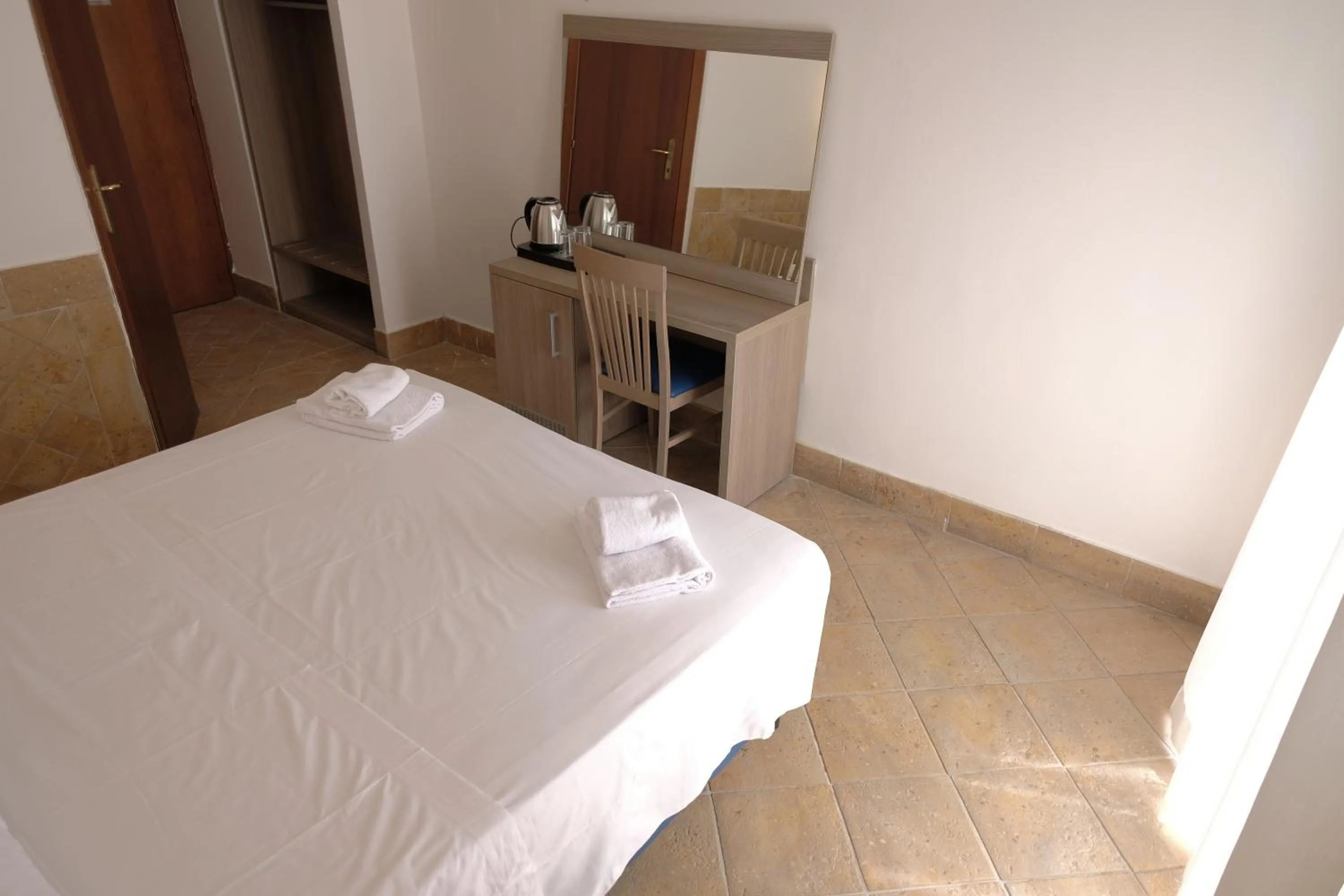 Bed in Hotel Alex Square