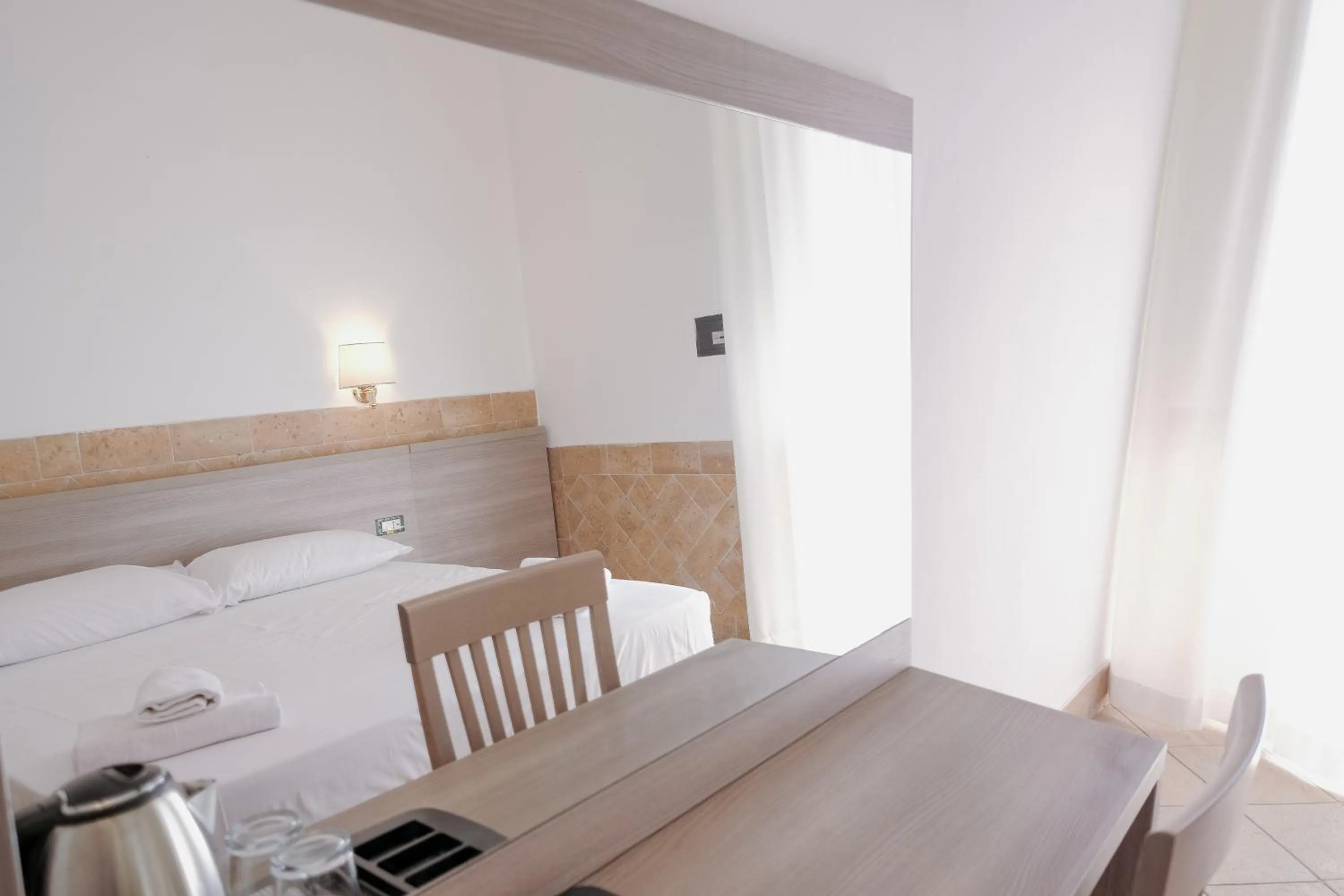 Bed in Hotel Alex Square