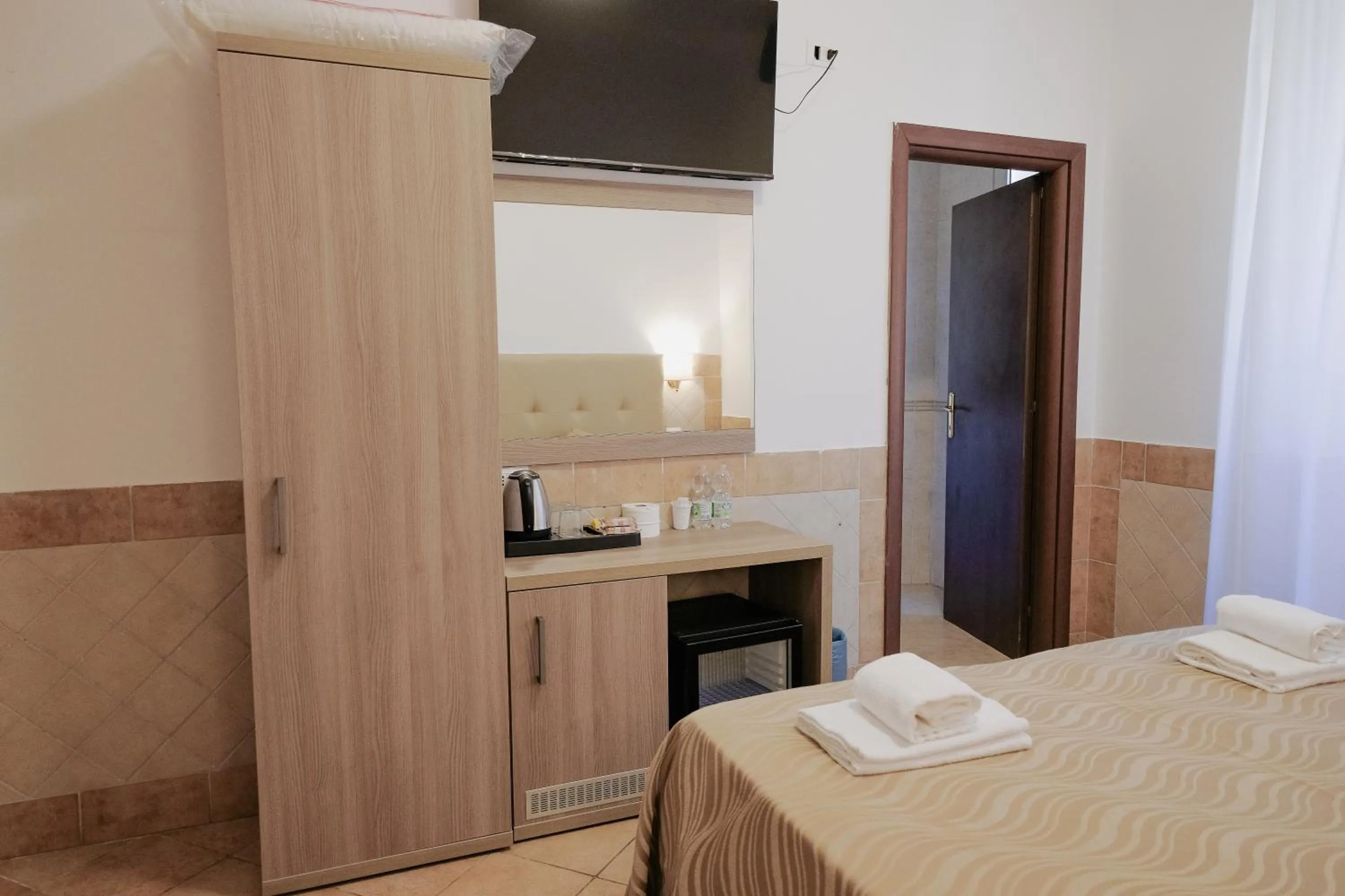 Bed in Hotel Alex Square