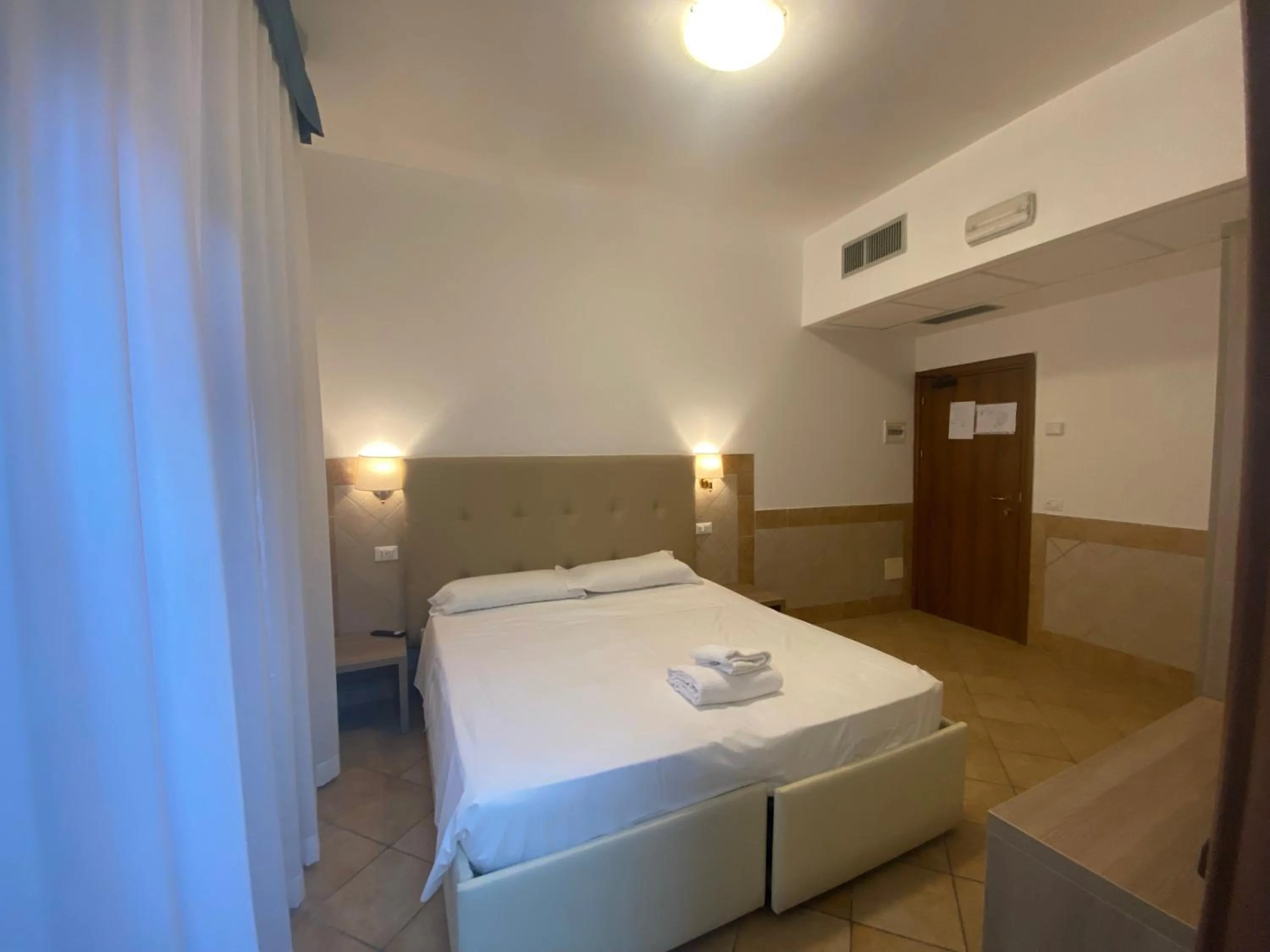 Bed in Hotel Alex Square