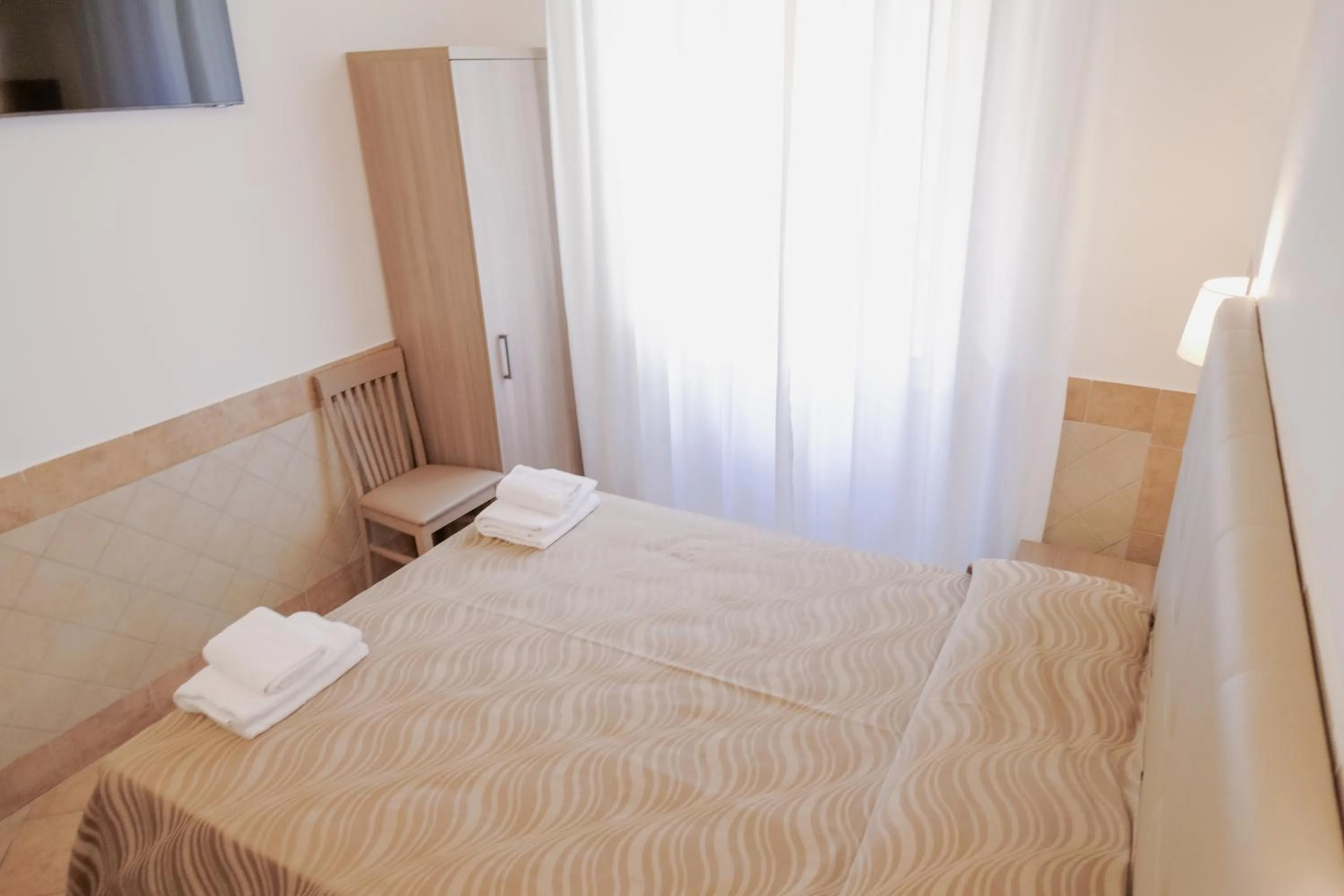 Bed in Hotel Alex Square