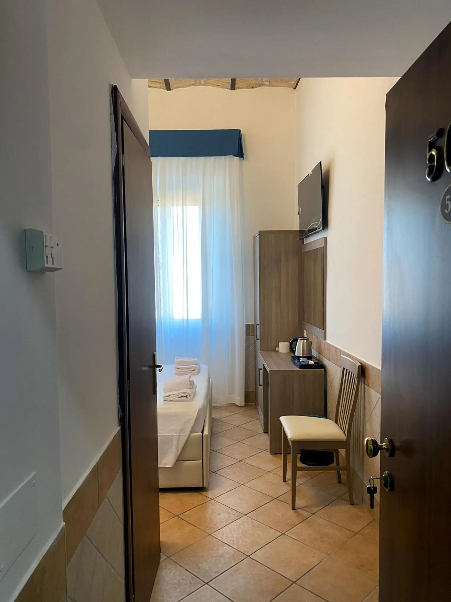 Bed in Hotel Alex Square