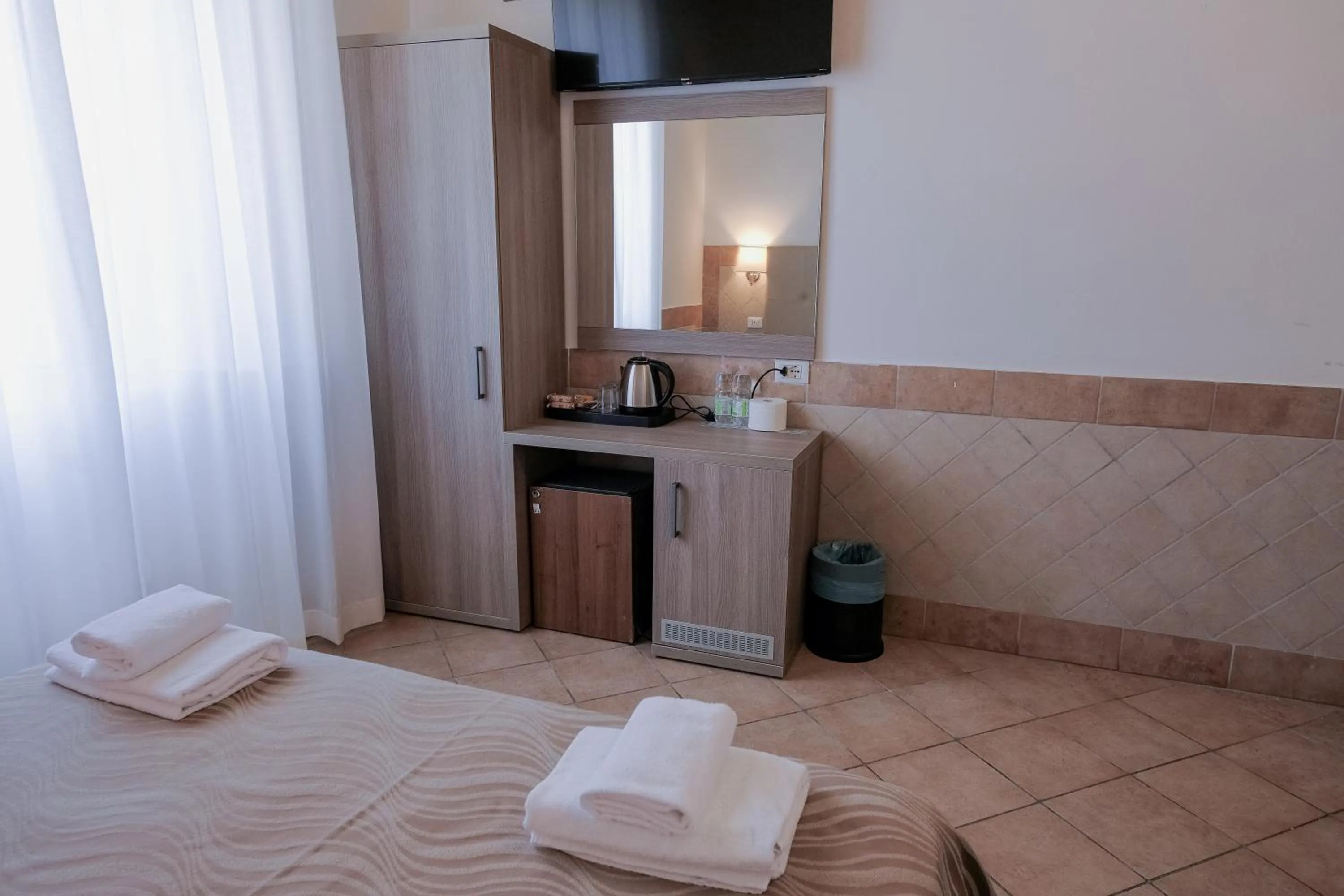 Bed in Hotel Alex Square