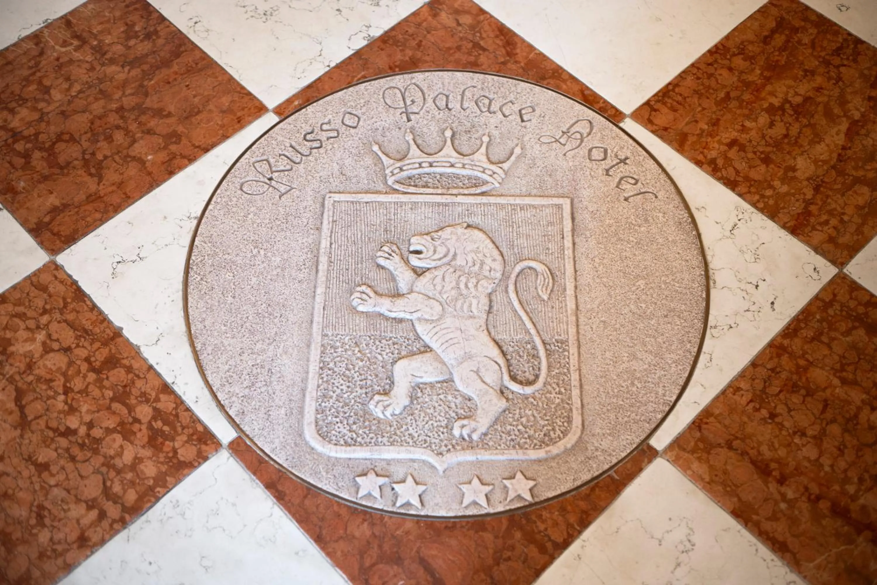 Property logo or sign in Hotel Russo Palace