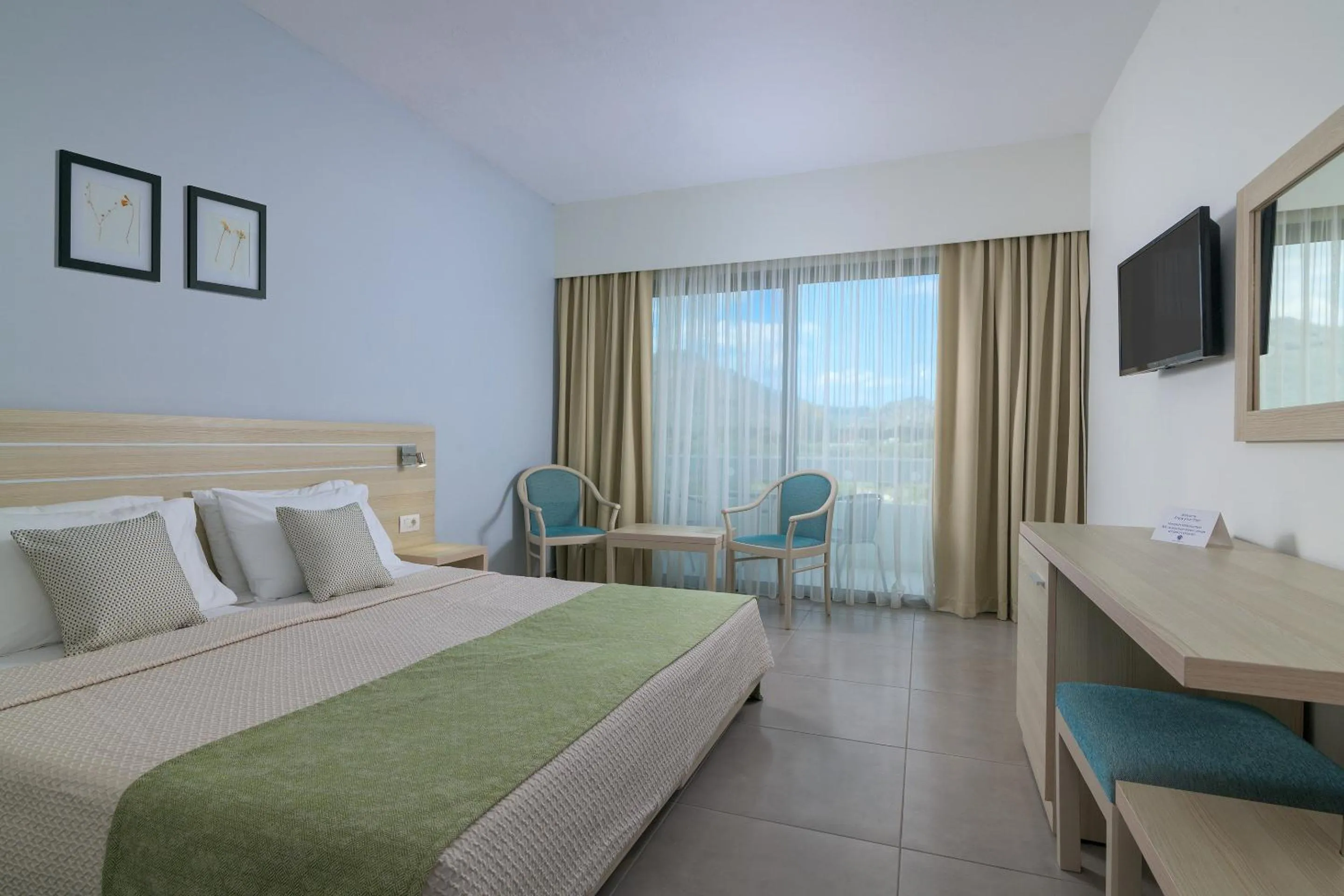 Photo of the whole room, Bed in Hotel Niriides Beach