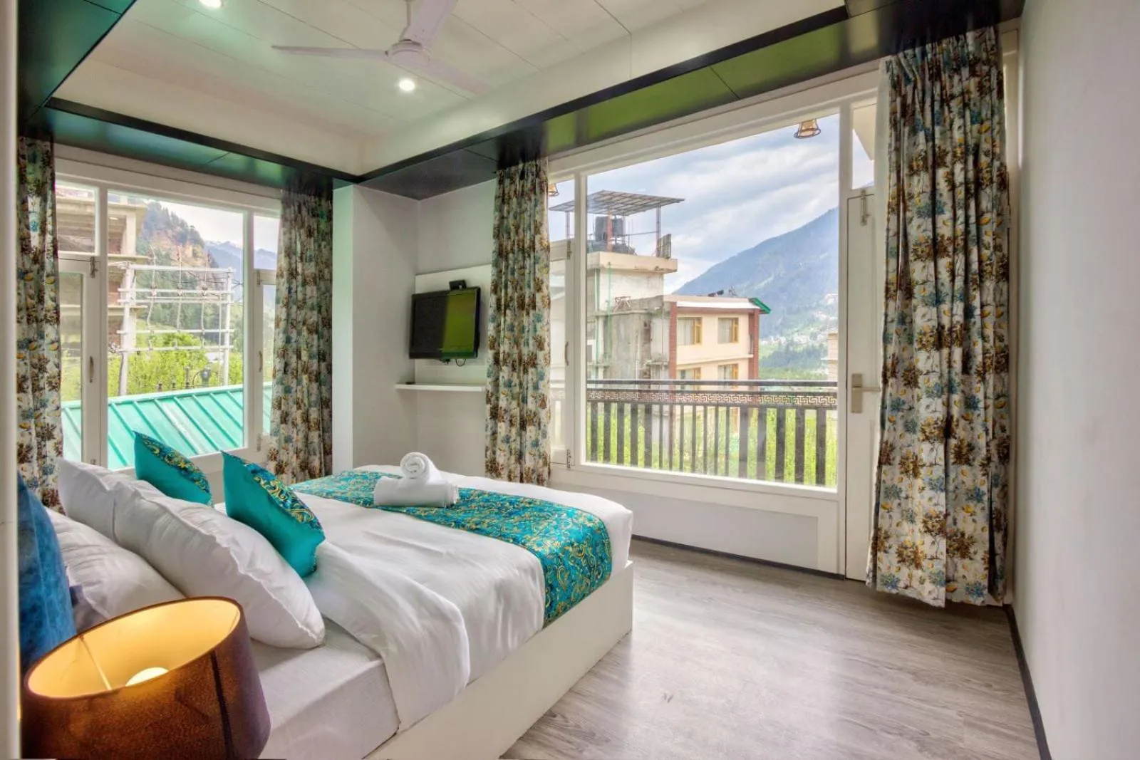 Living room, Bed in vella Marina Group of hotels Sol Resort Manali #Atithi Devo Bhava hotel in manali #Free Parking #Mall Road 500m#Mountain view hotel
