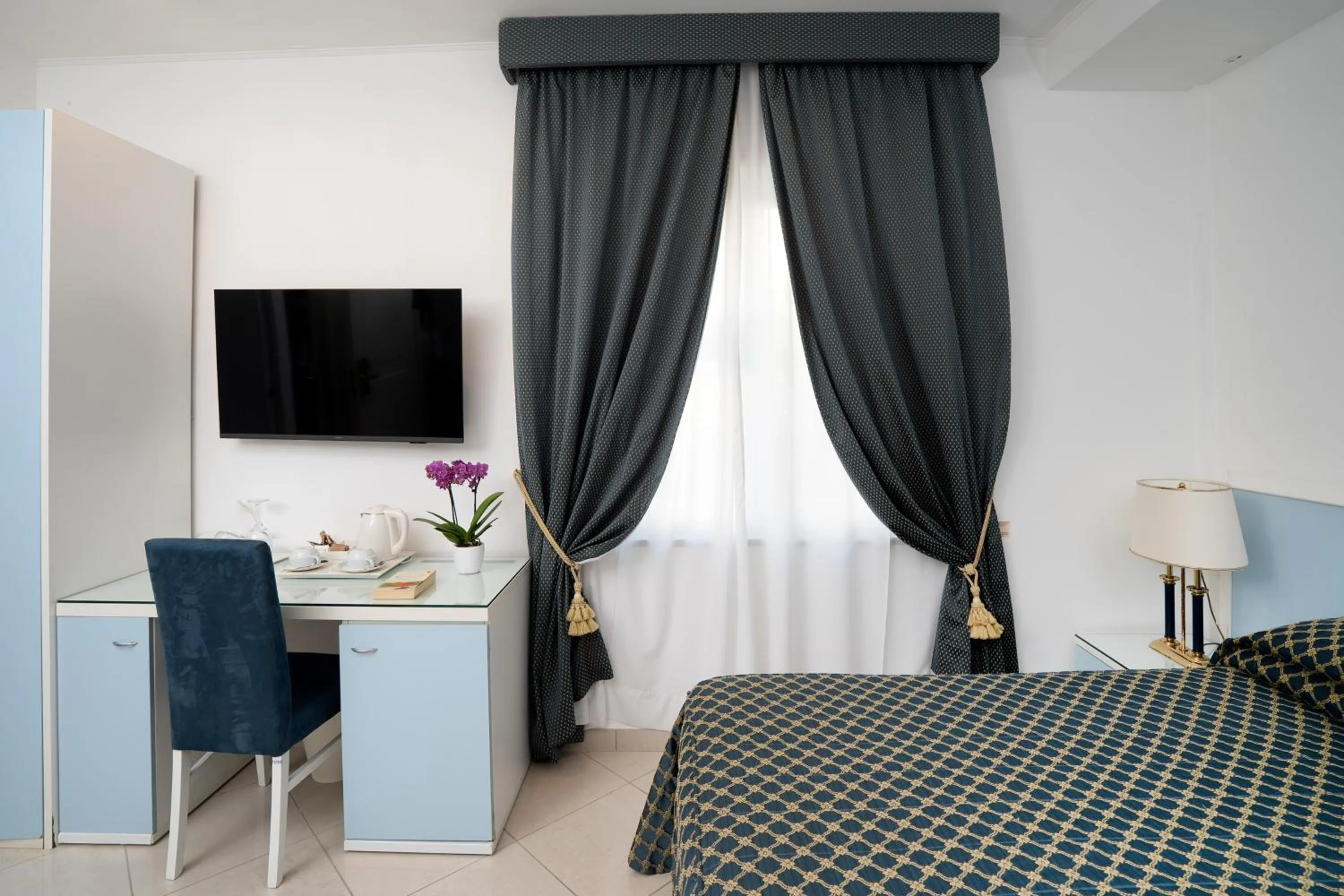 Bed in Hotel Weber Ambassador