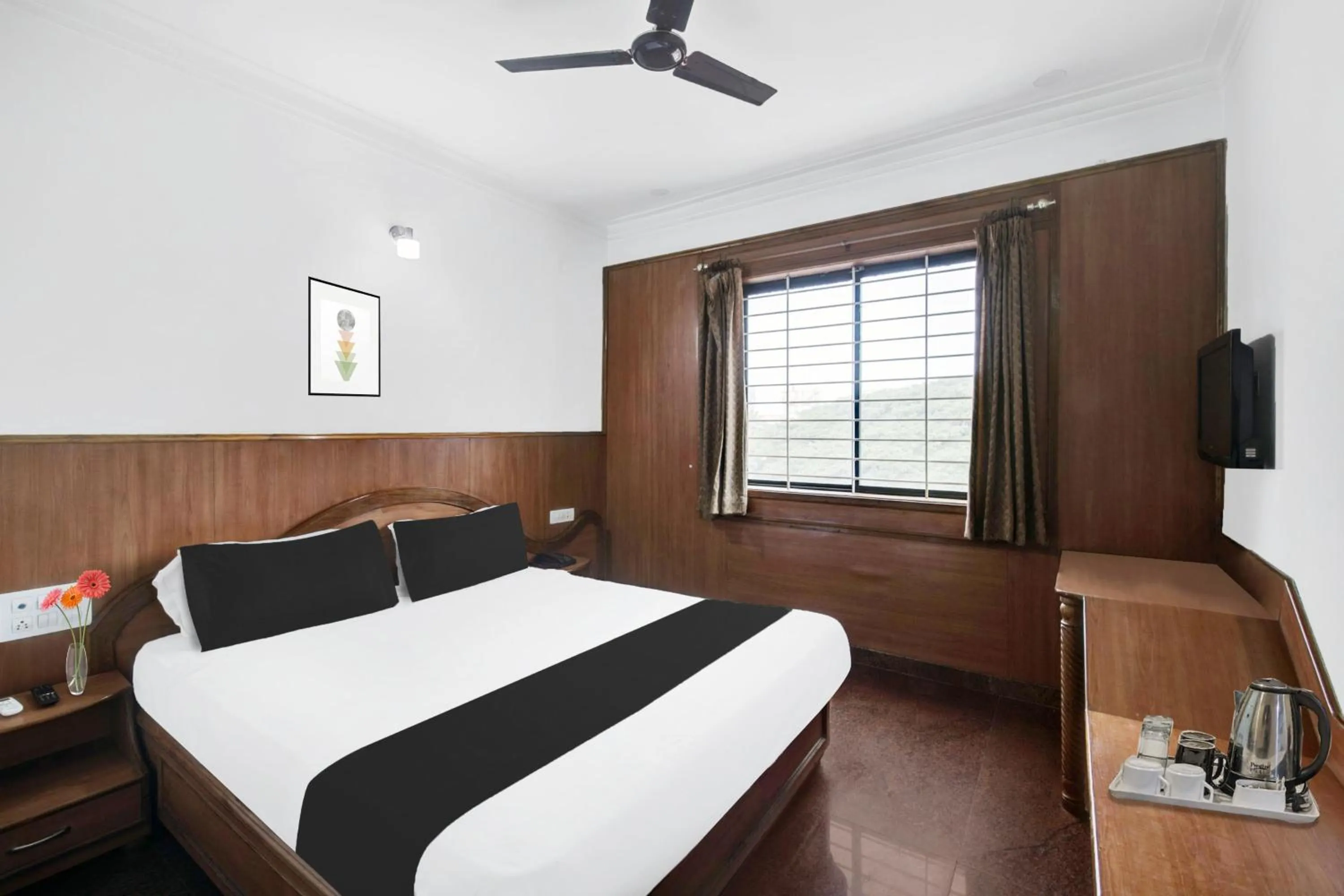 Bedroom, Bed in Super Townhouse Mysore City Centre Formerly Hotel Mahendra