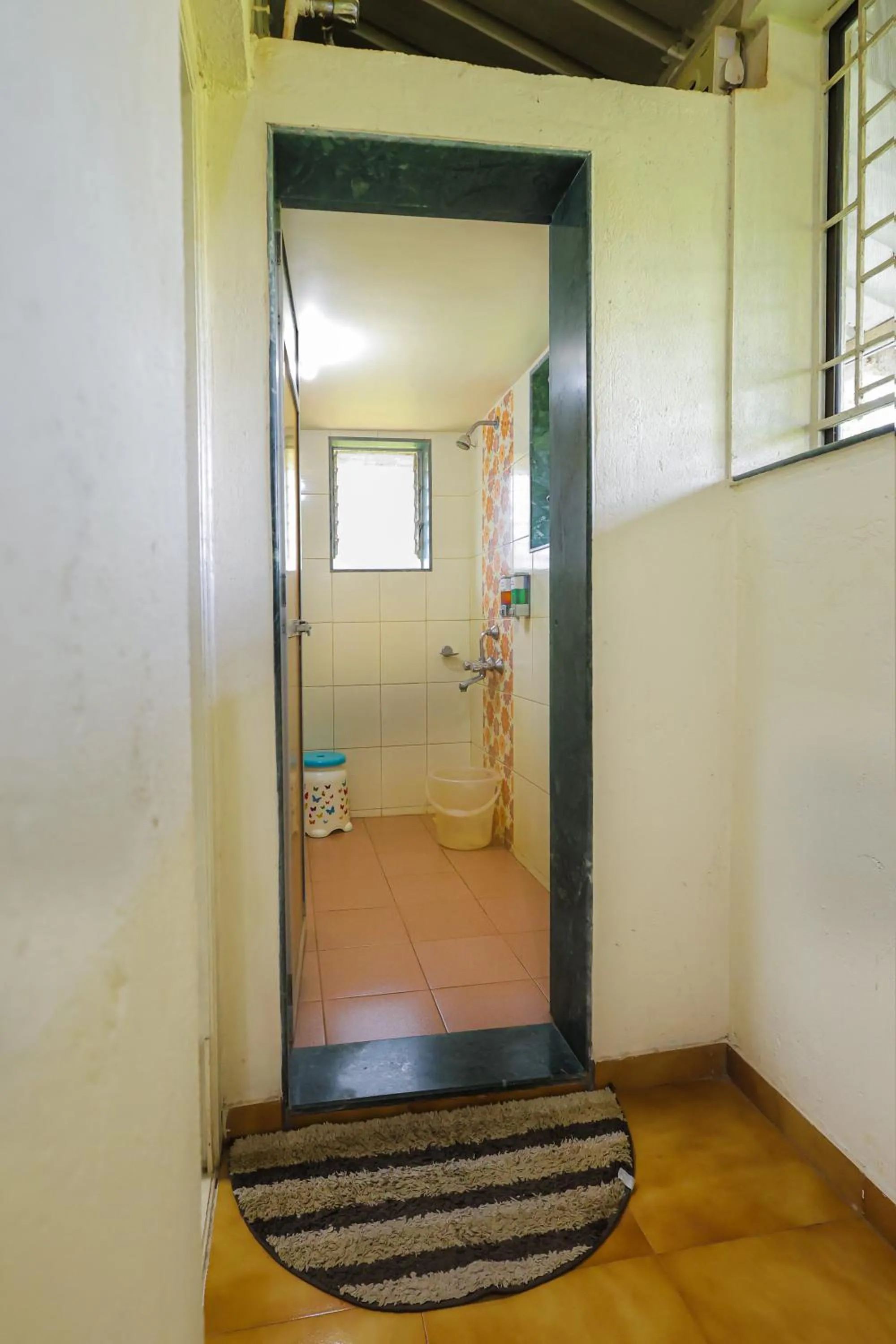 Shower in Kokanwadi Resort