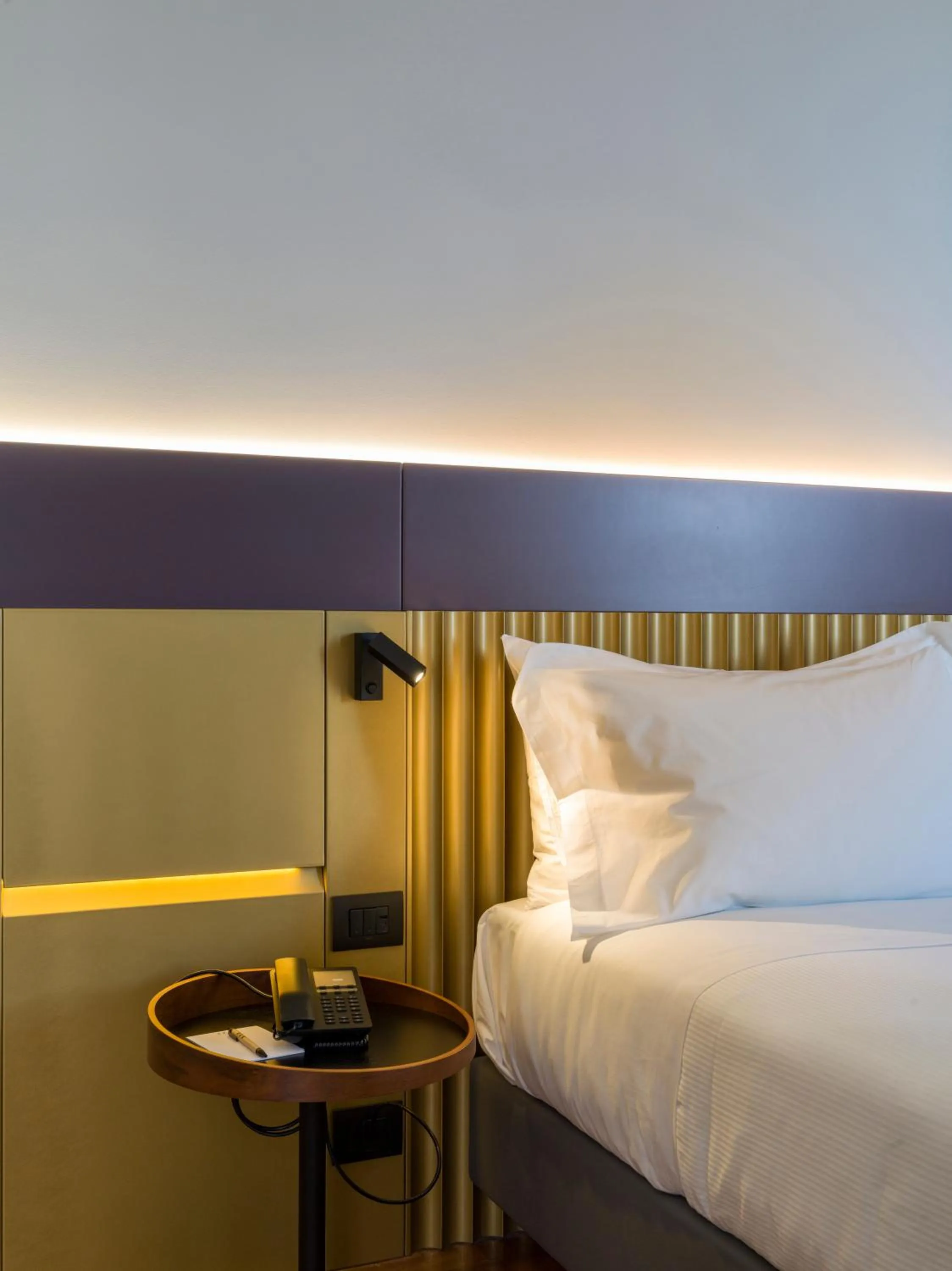 Bed in UNA Hotels One Catania