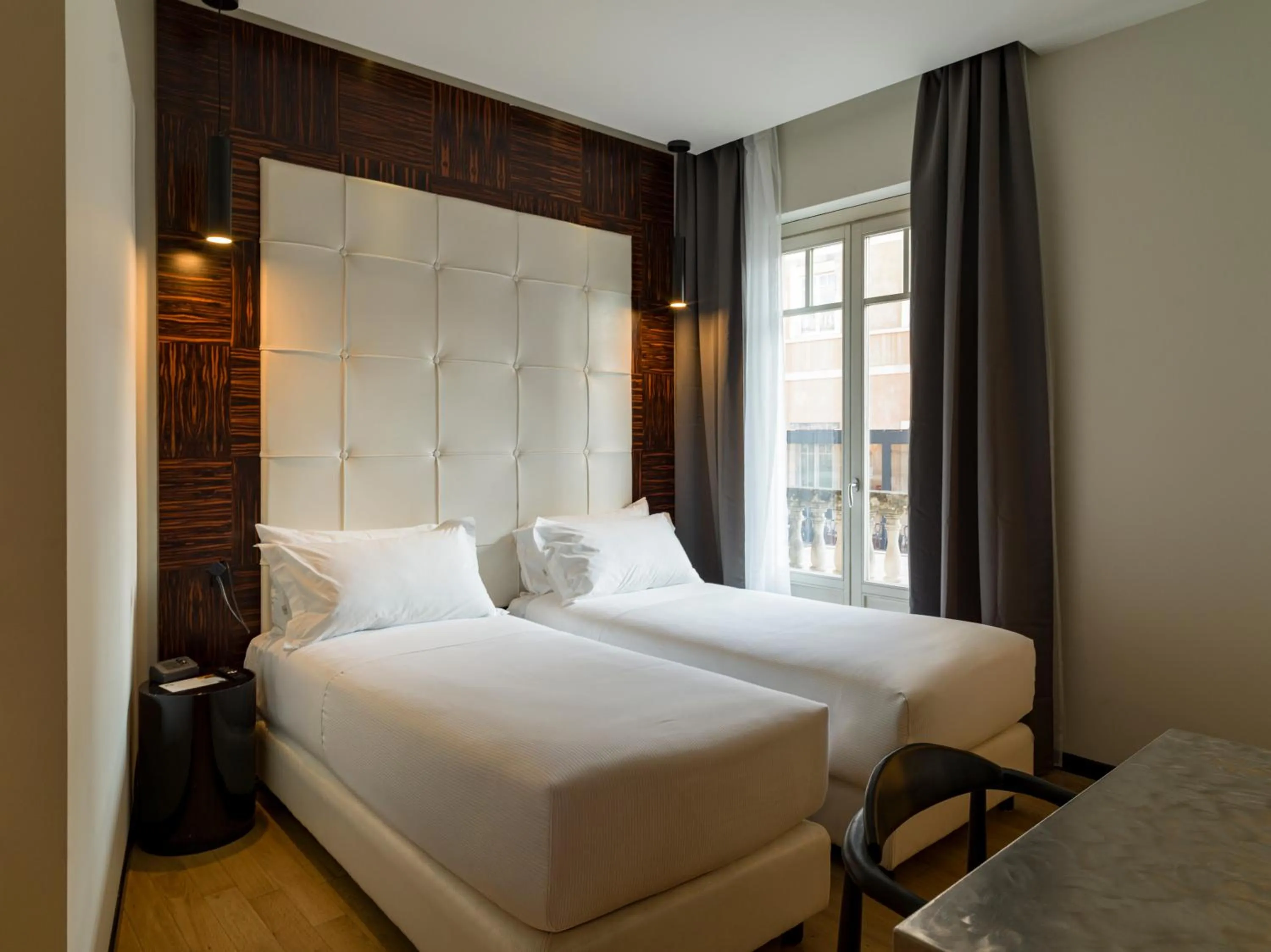 Bed in UNA Hotels One Catania