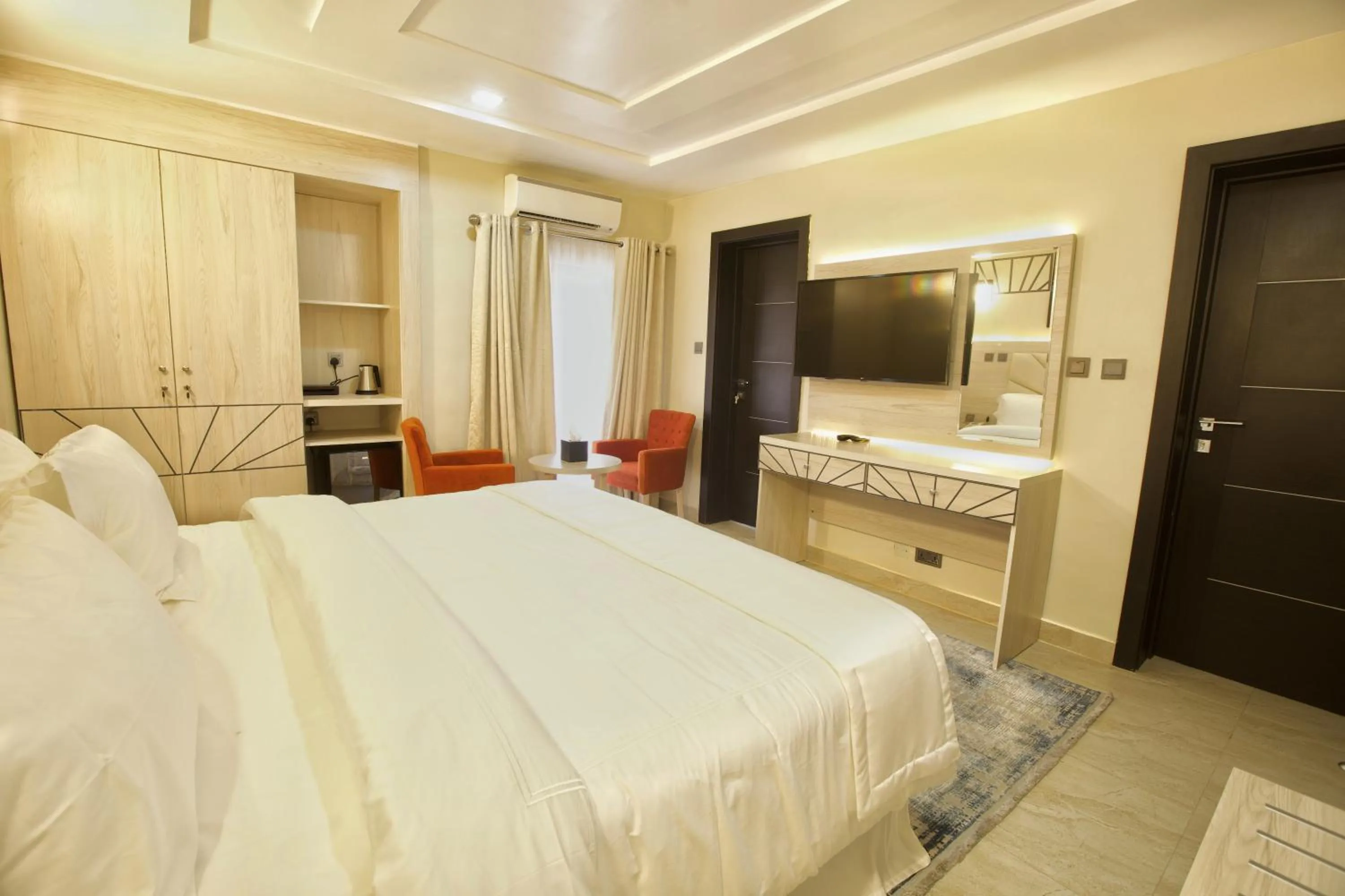 TV and multimedia, Bed in Musada Luxury Hotels and Suites
