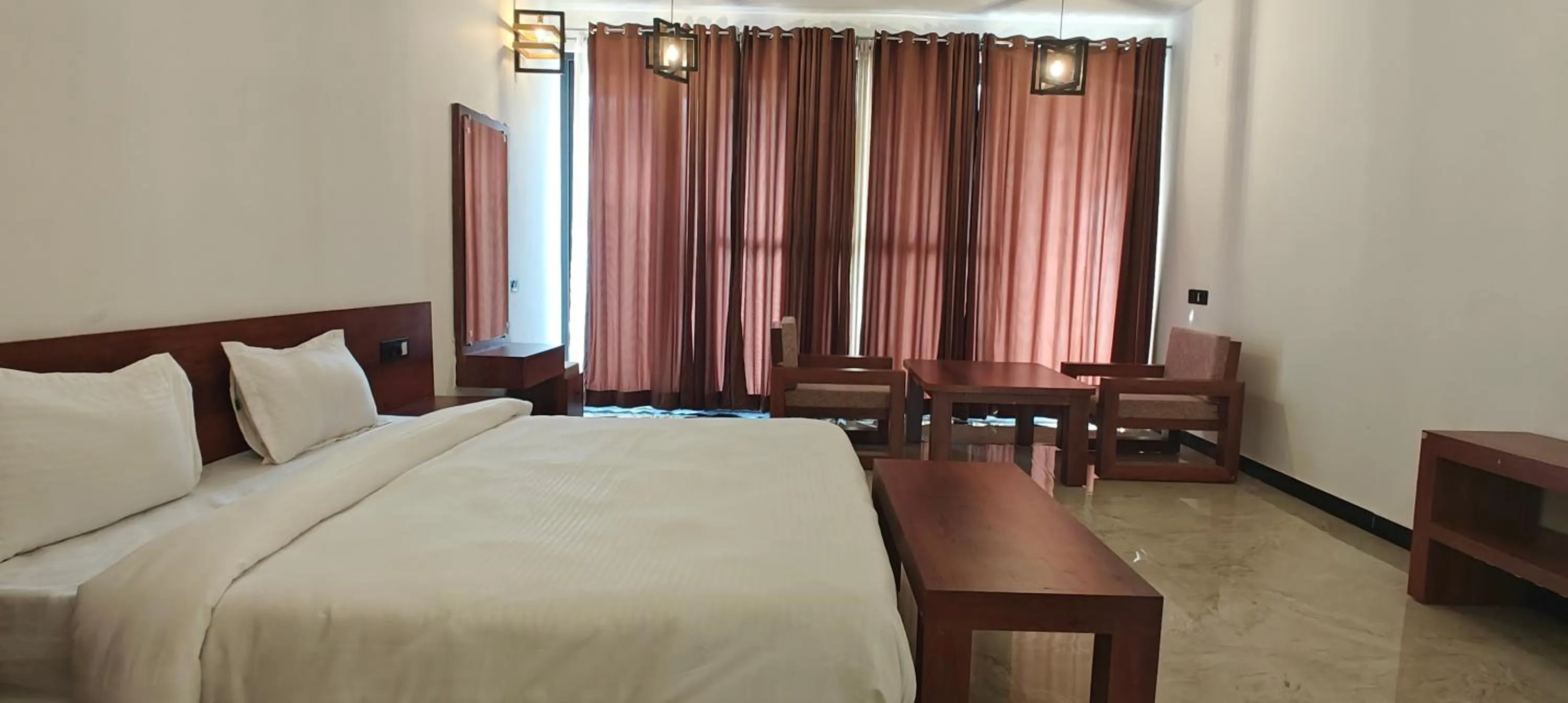 Bed in The HighGarden Resort