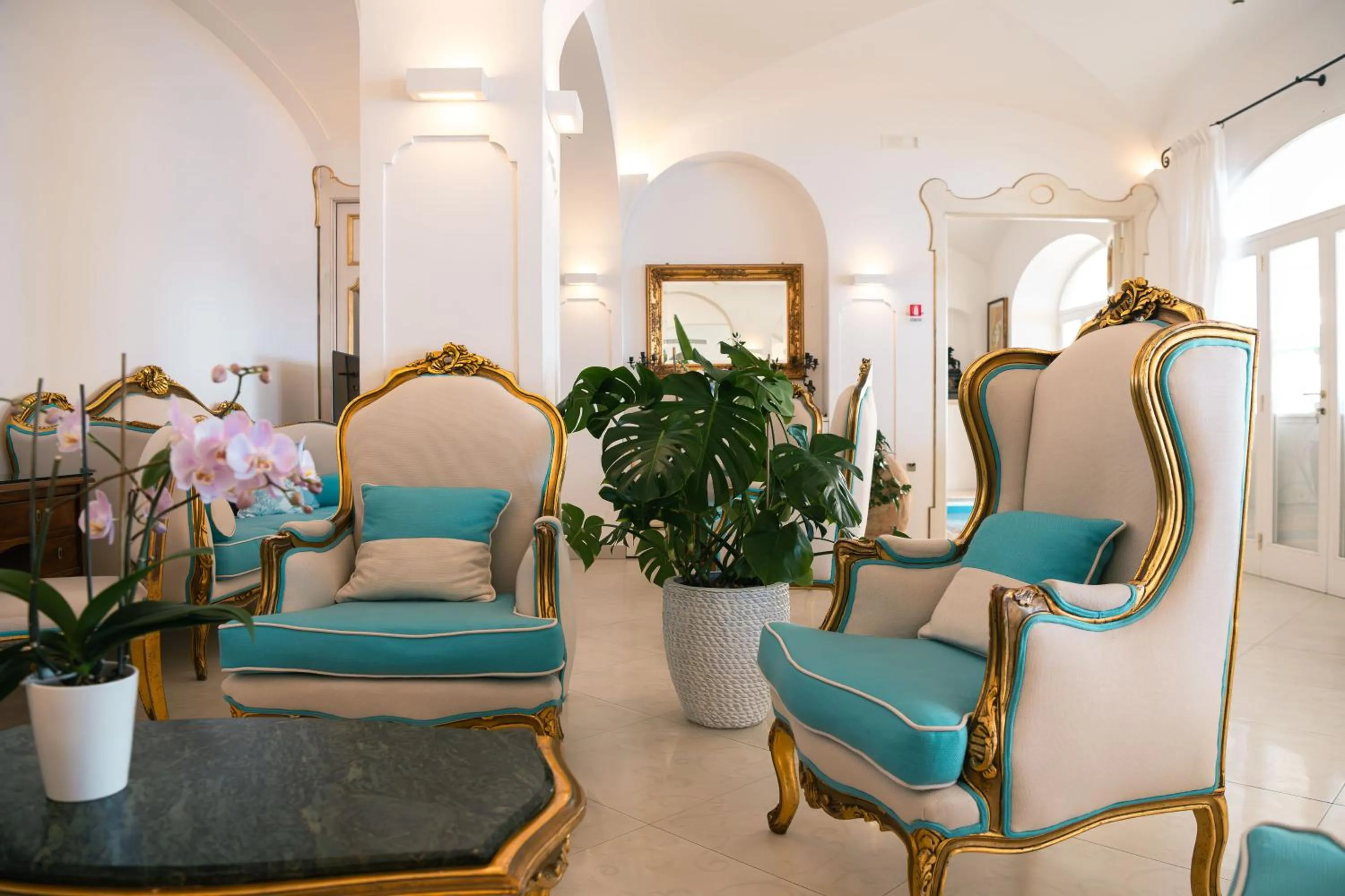 Communal lounge/ TV room in Hotel Conca d'Oro