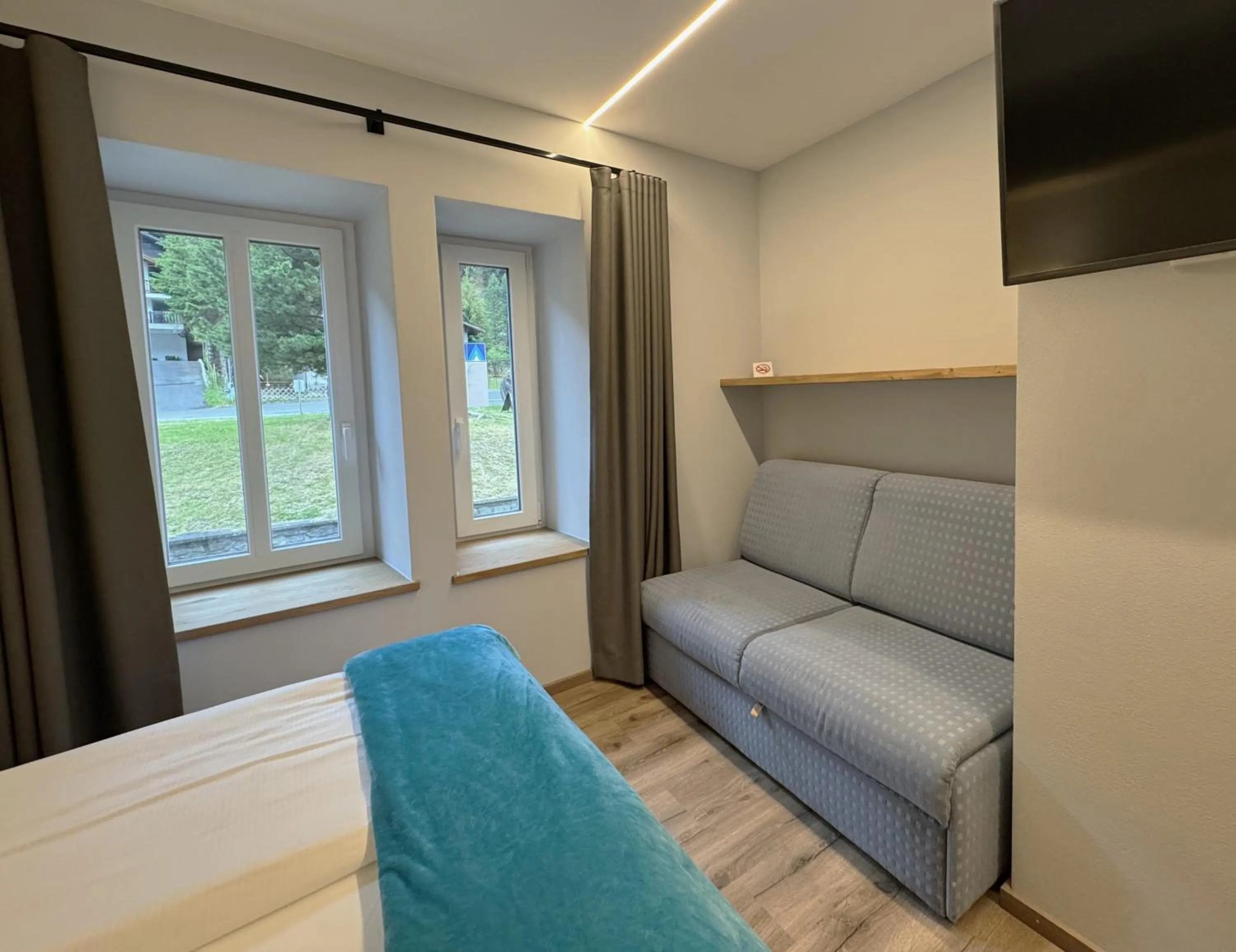 Bed in Glacier Rock guesthouse ex Pension Dangl