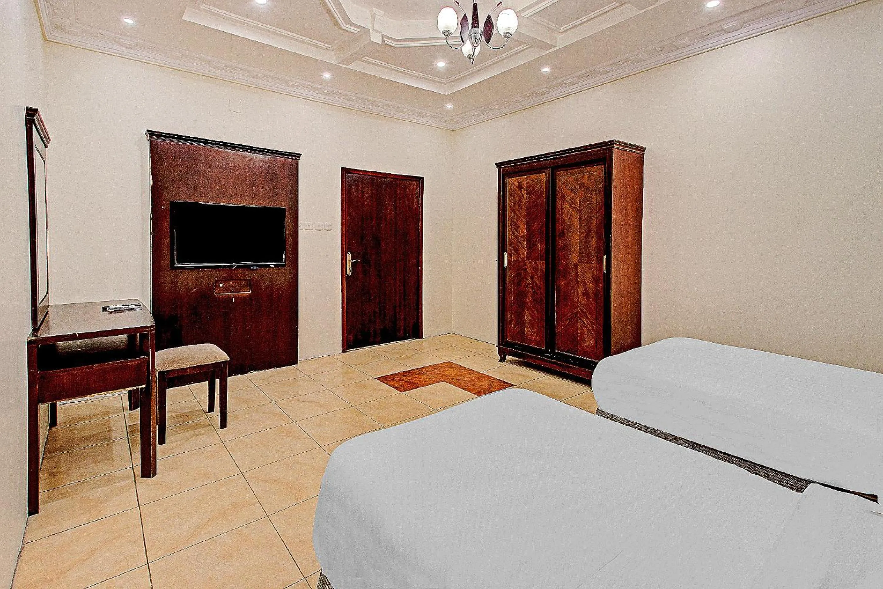 Photo of the whole room, TV/Entertainment Center in OYO 601 Ibs For Residential Units