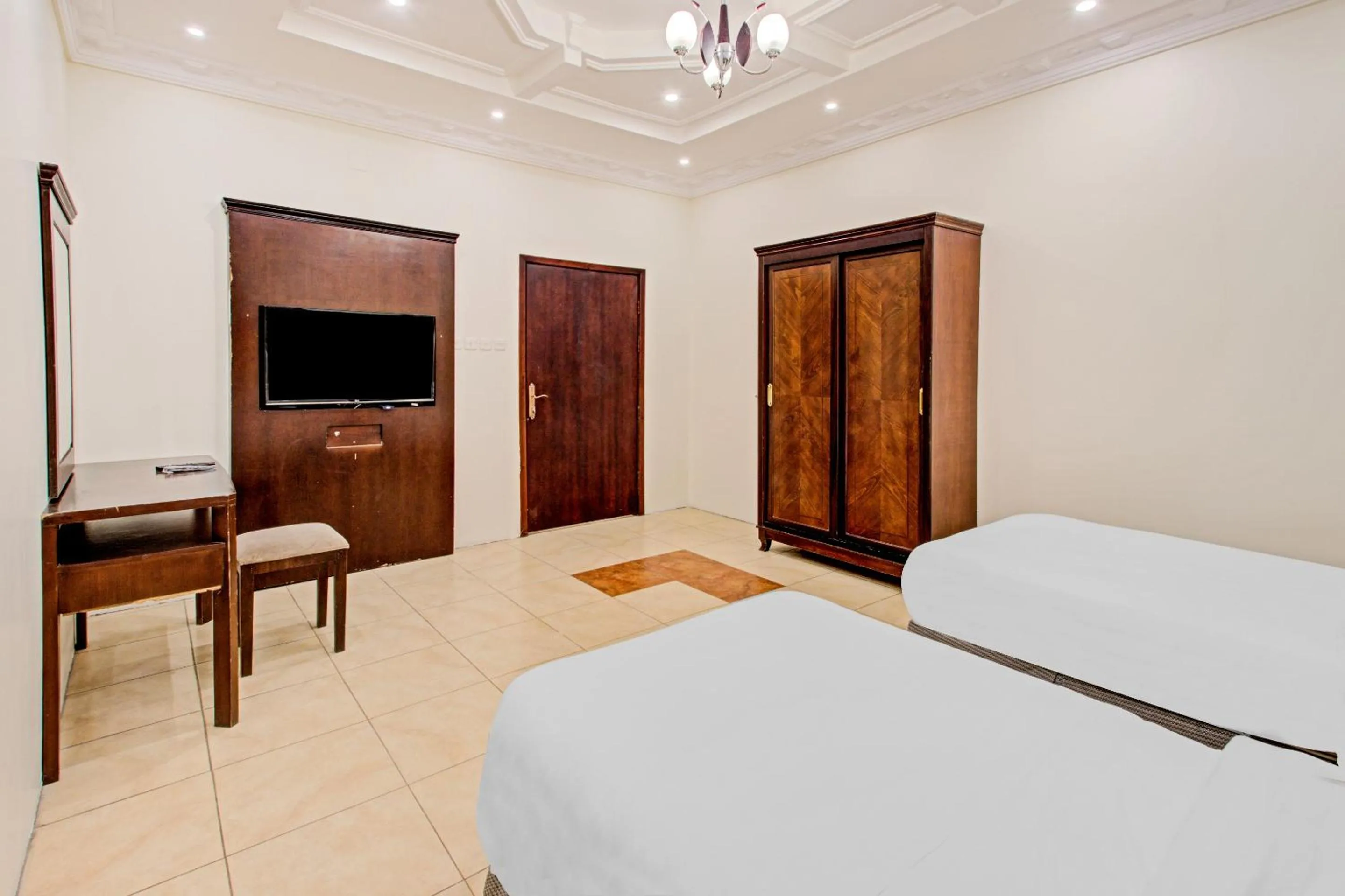 Photo of the whole room, TV/Entertainment Center in OYO 601 Ibs For Residential Units