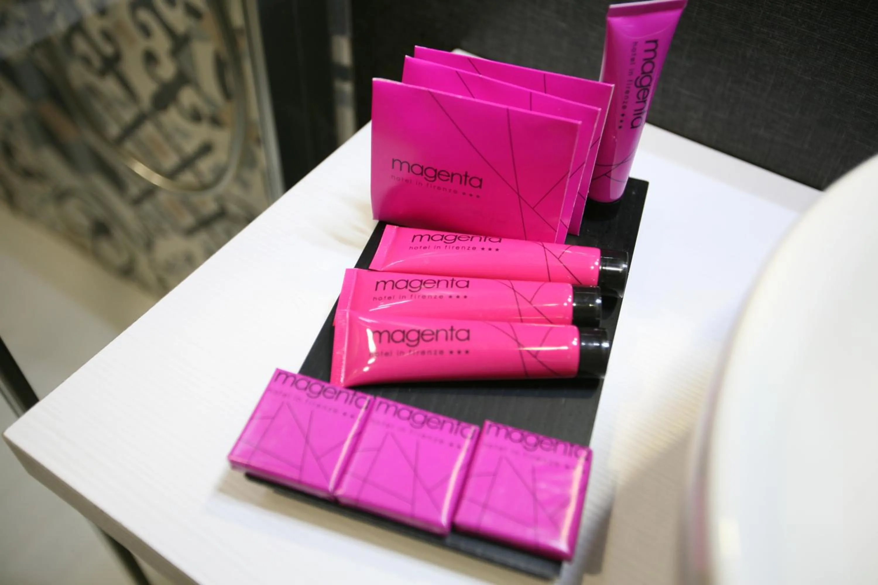 Property logo or sign in Hotel Magenta