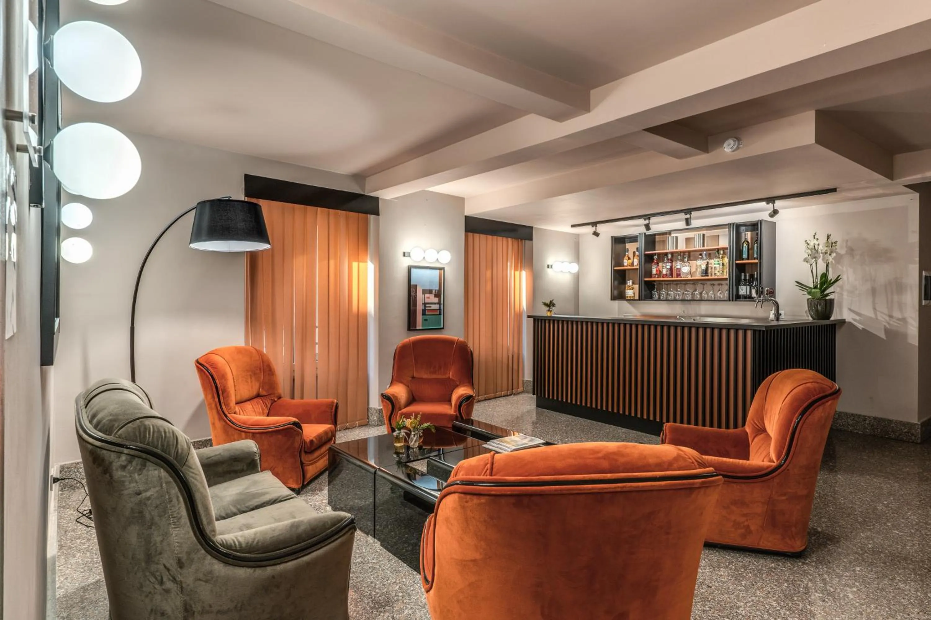 Communal lounge/ TV room in Madison Hotel