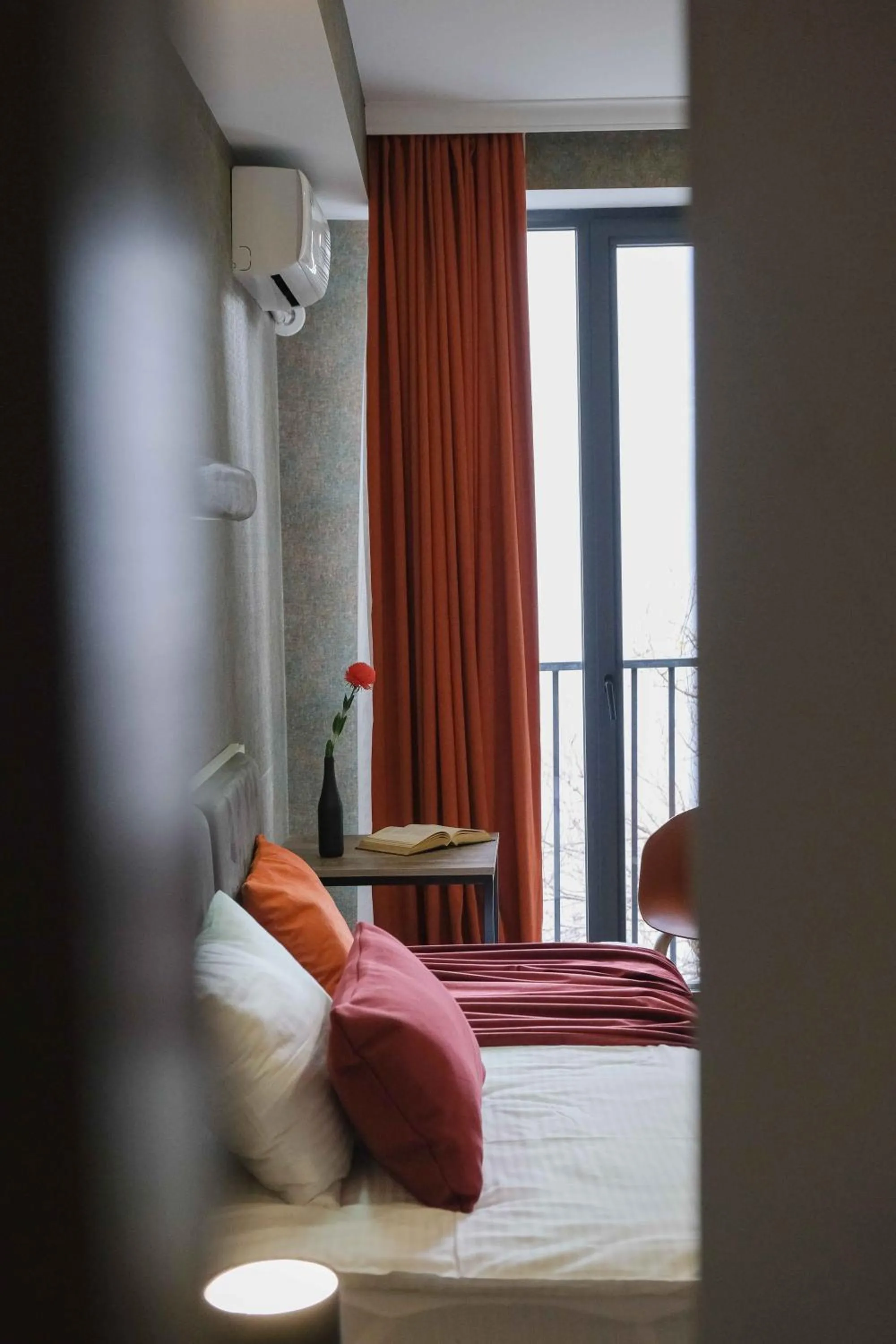 Bed in Round Garden Hotel