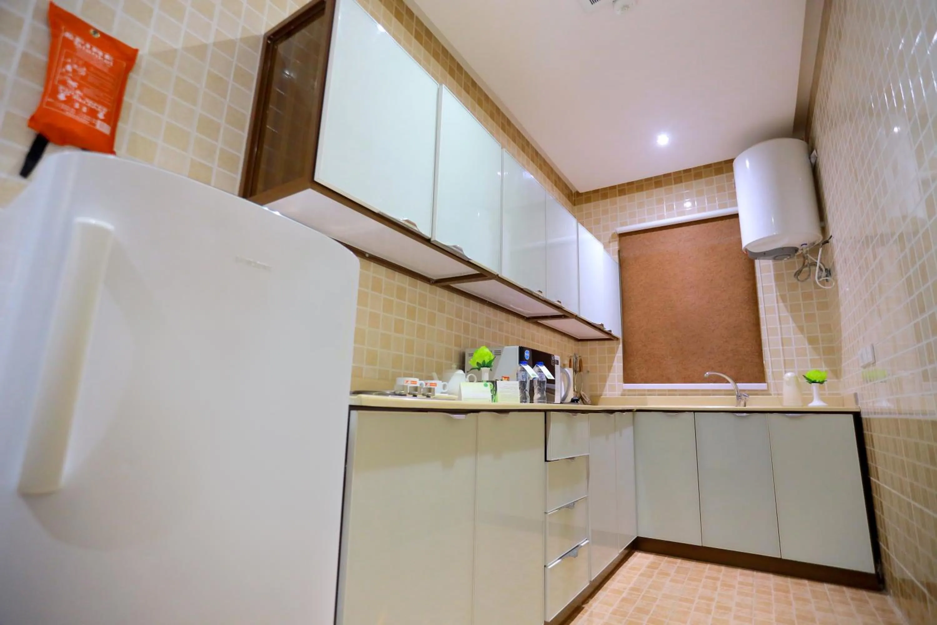 kitchen in Hospitality Path Serviced Apartments