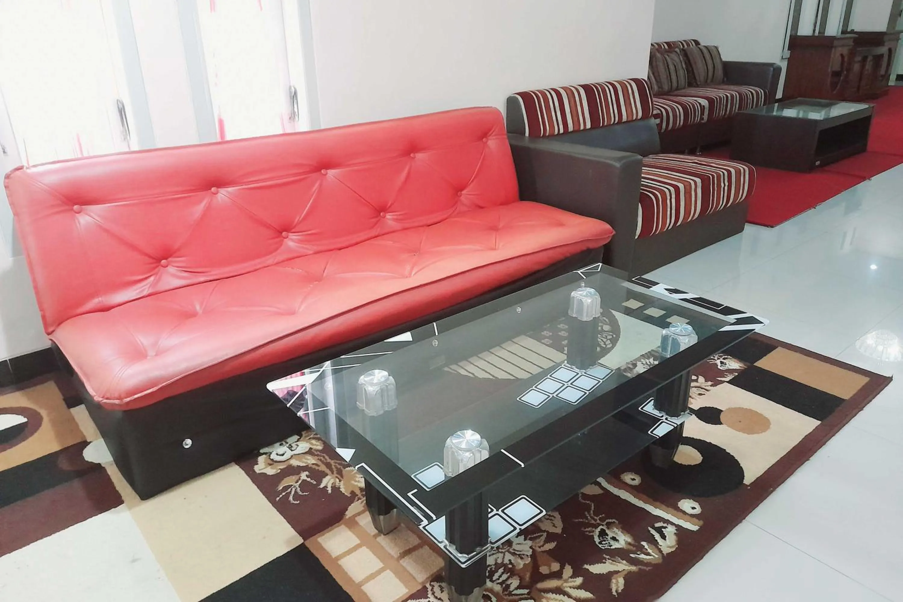 Living room in RedDoorz Syariah near Komplek Candi Arjuna Dieng 2