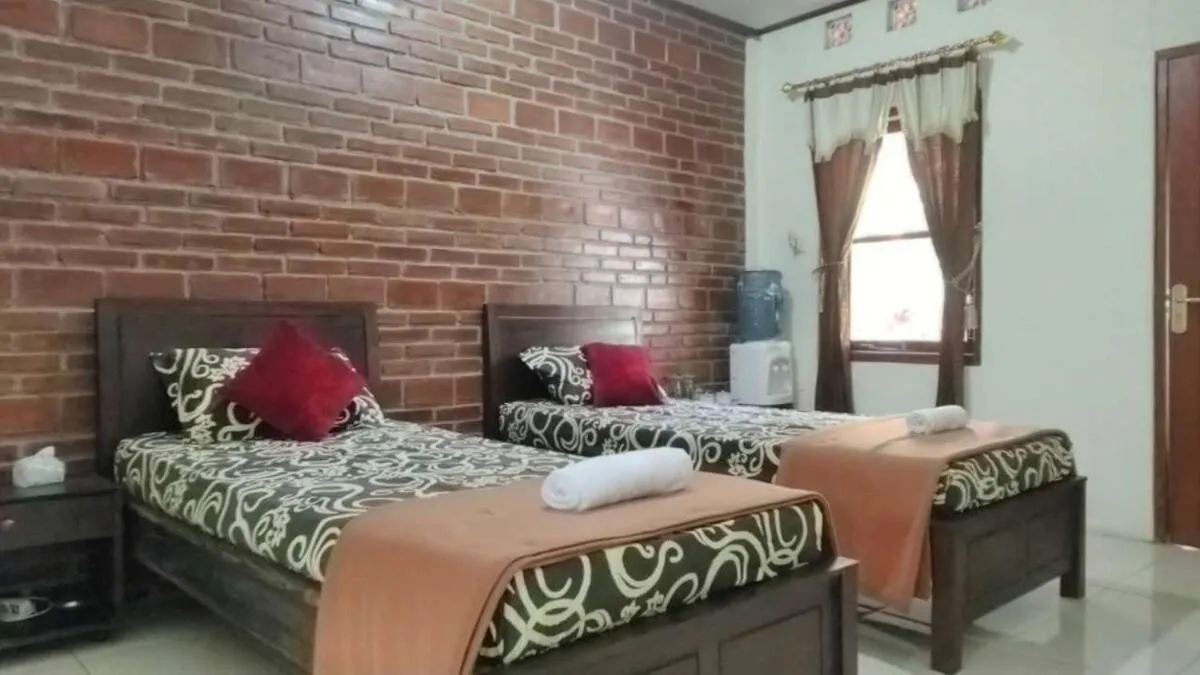 Bed in Penginapan Homestay Mudiyono Syari'ah