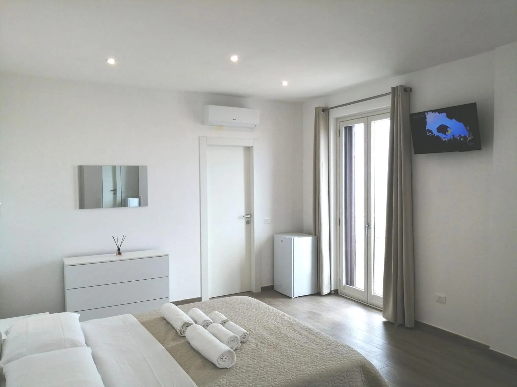 Bed in AMARE Bed & Breakfast