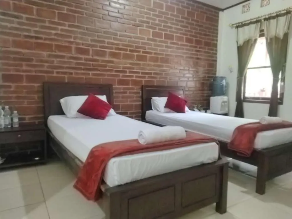 Bed in Penginapan Homestay Mudiyono Syari'ah