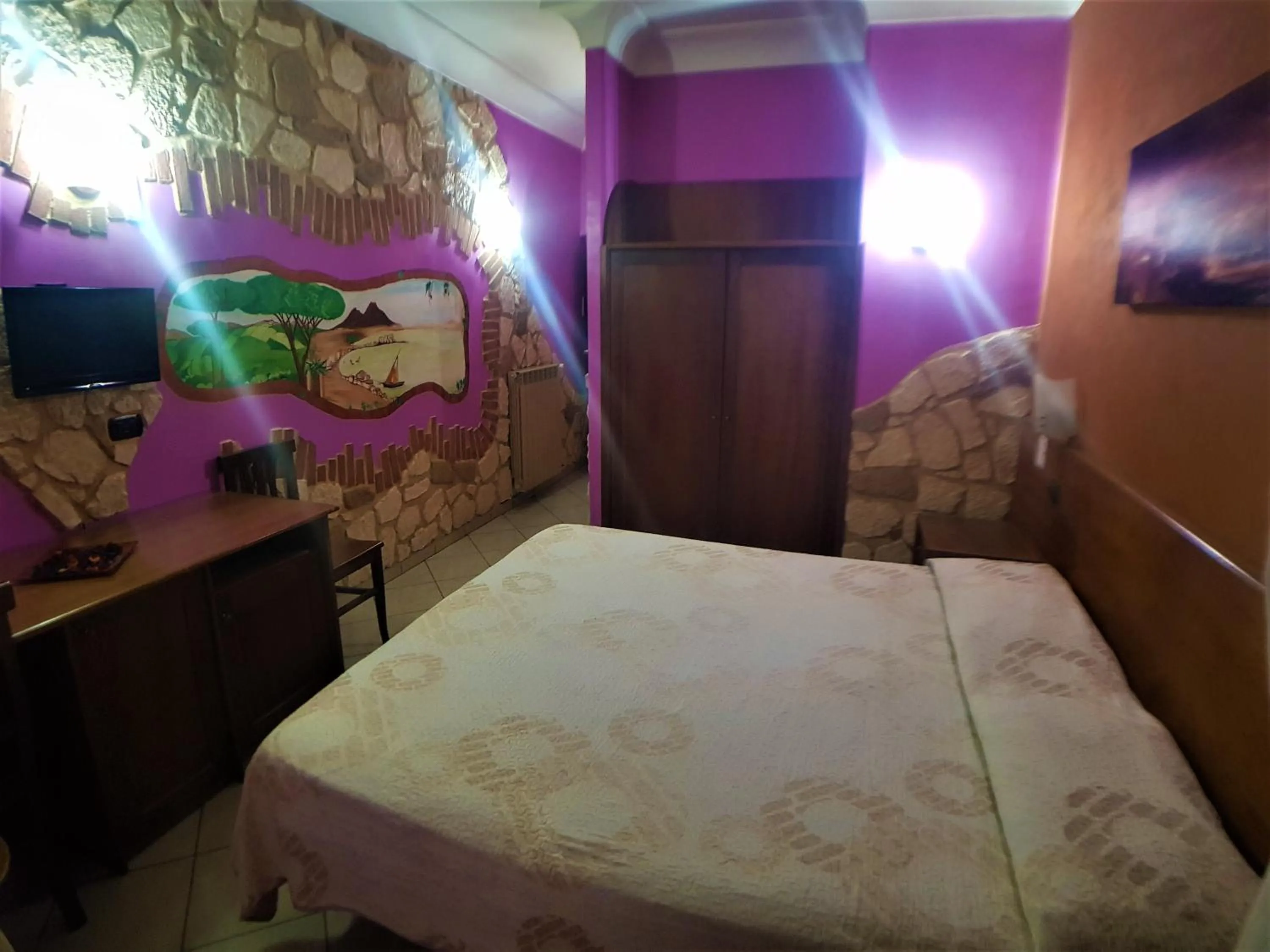 Bed in Hotel Ginevra