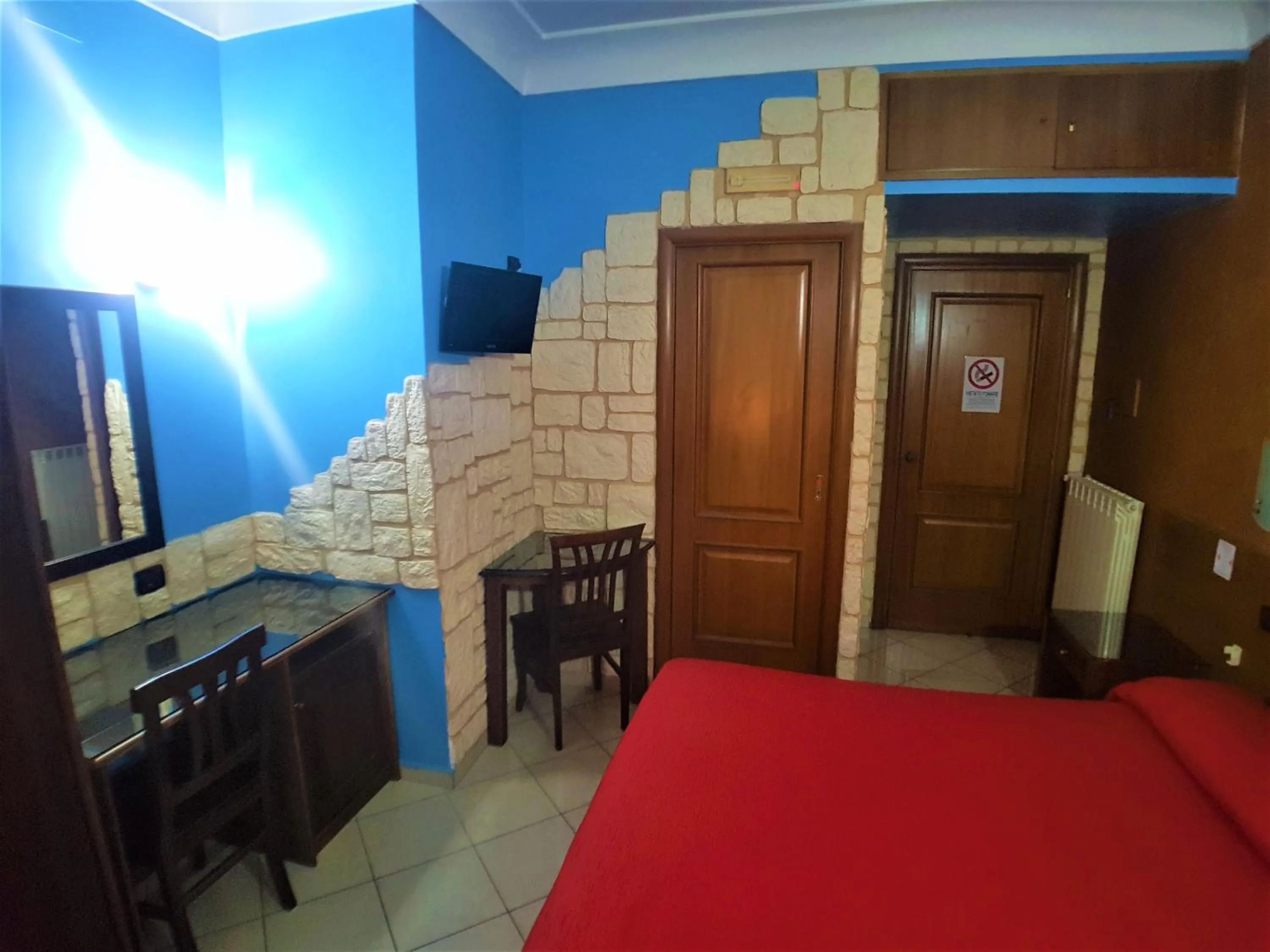 Bed in Hotel Ginevra