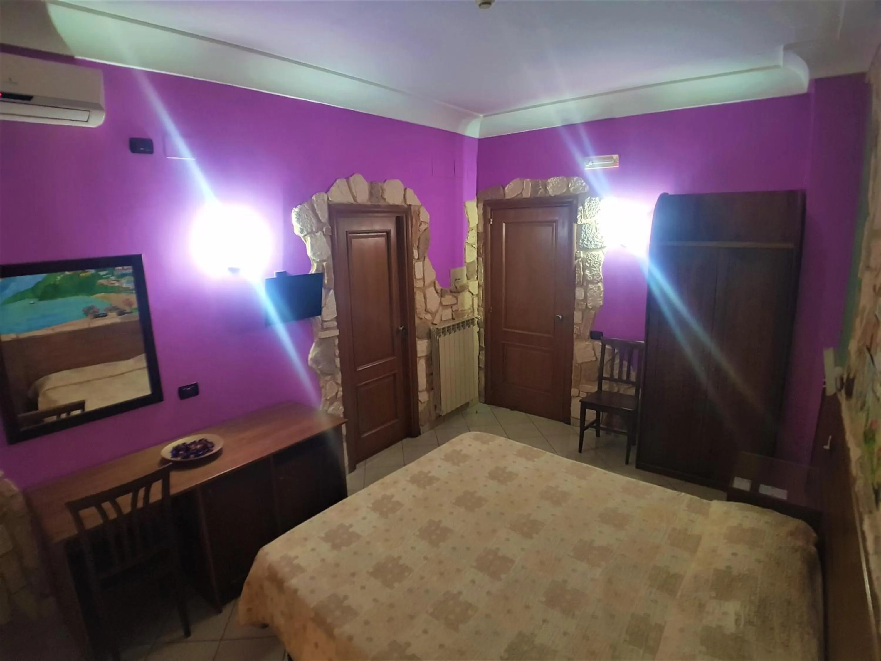 Bed in Hotel Ginevra