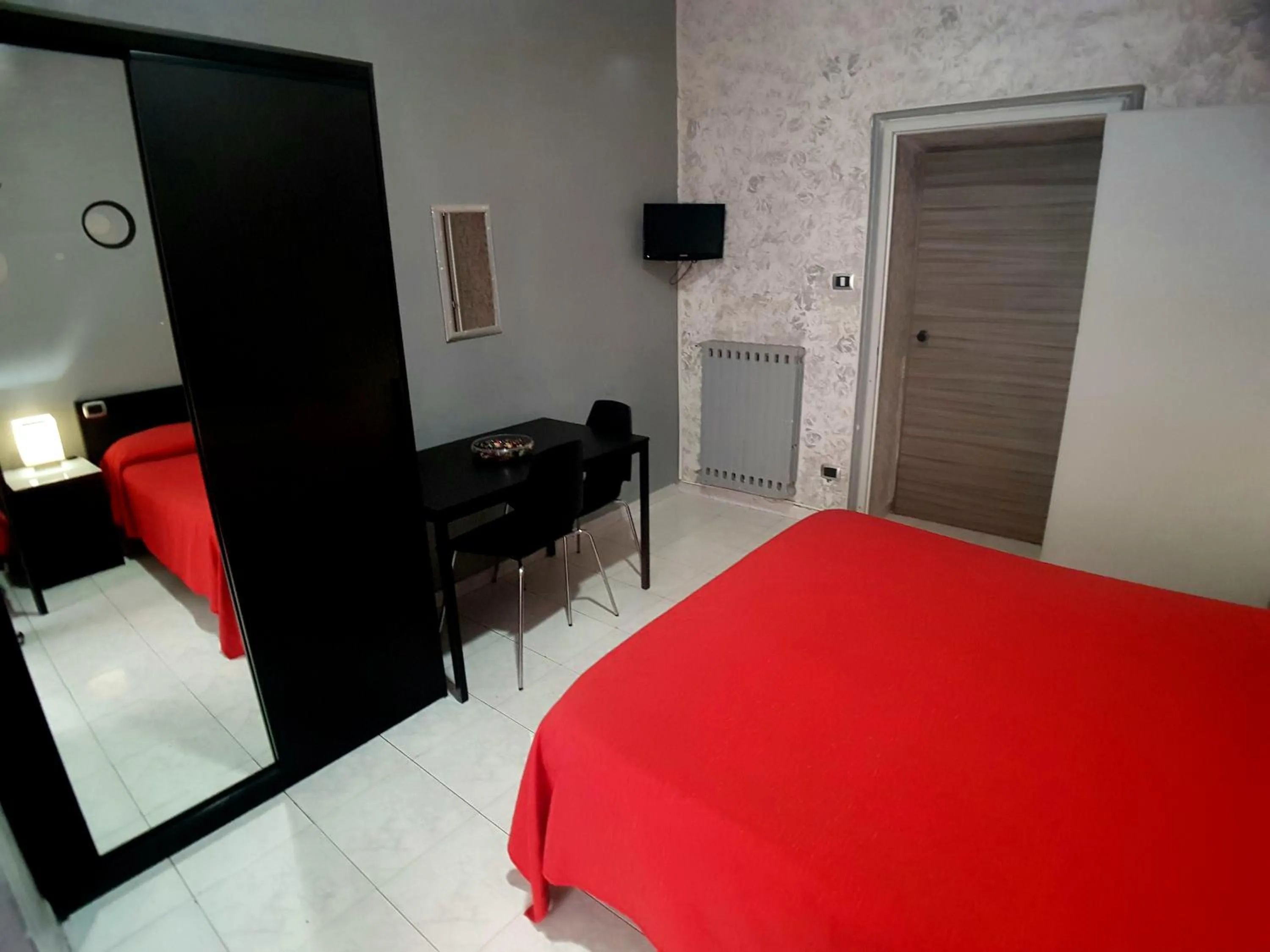 Bed in Hotel Ginevra