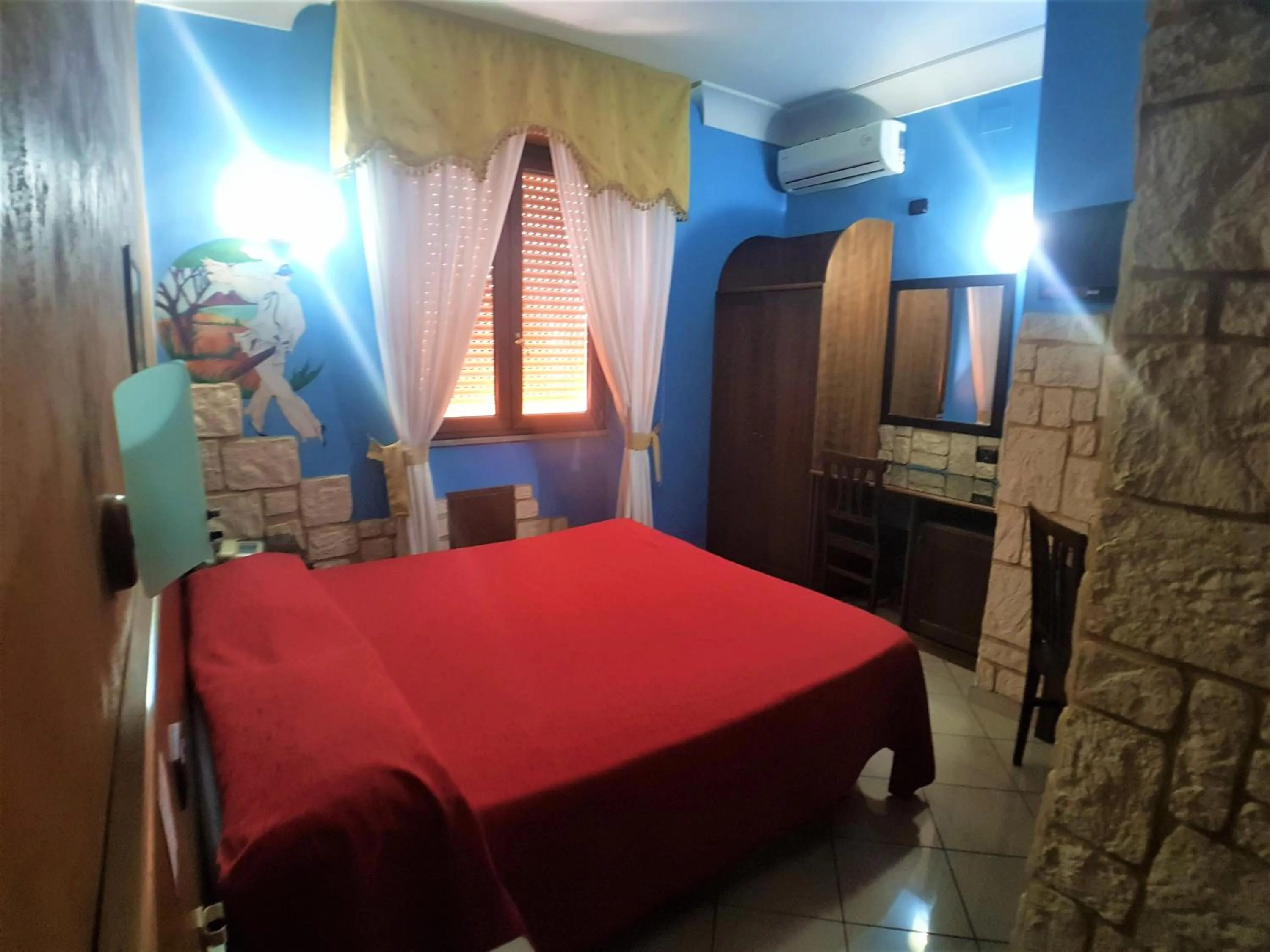 Bed in Hotel Ginevra