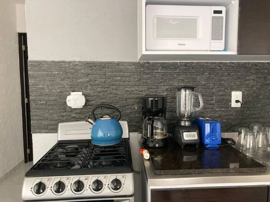 Kitchen or kitchenette in Cancun Oceanfront, Entire Apartment