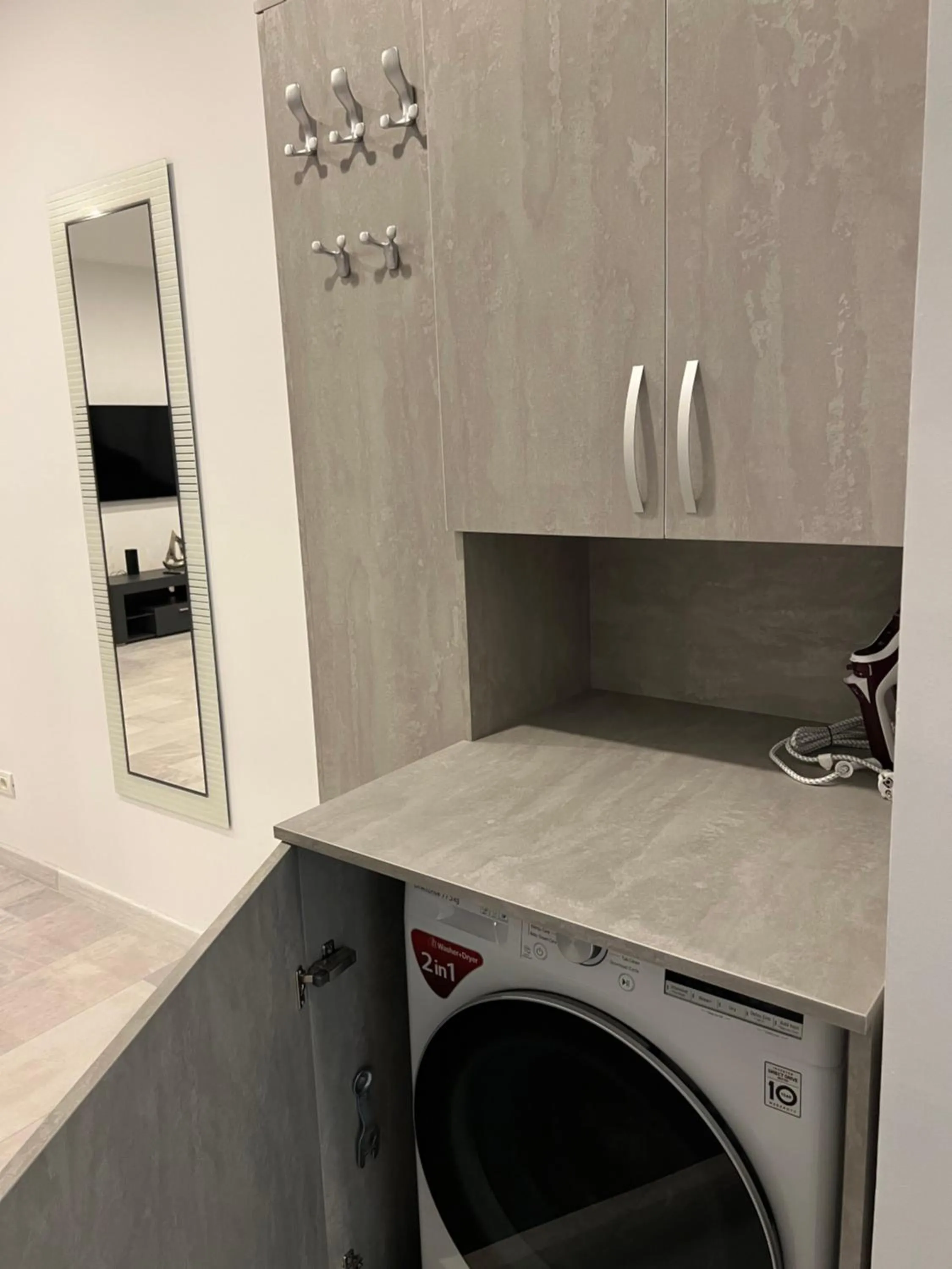 washing machine in Stunning 2-Room Penthouse with Lakeview W11