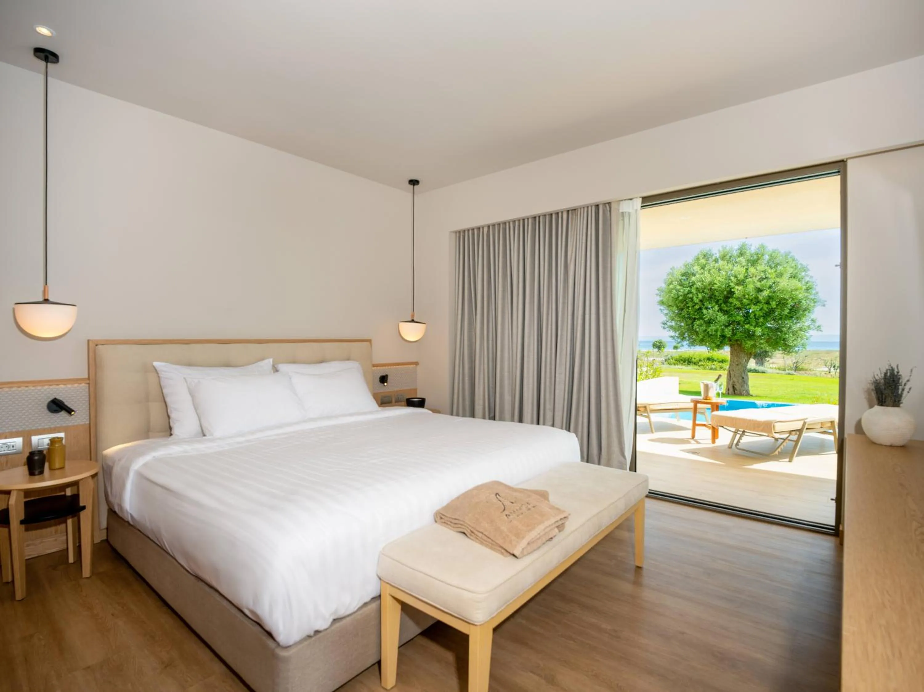 Balcony/Terrace, Bed in Ammoa Luxury Hotel & Spa Resort