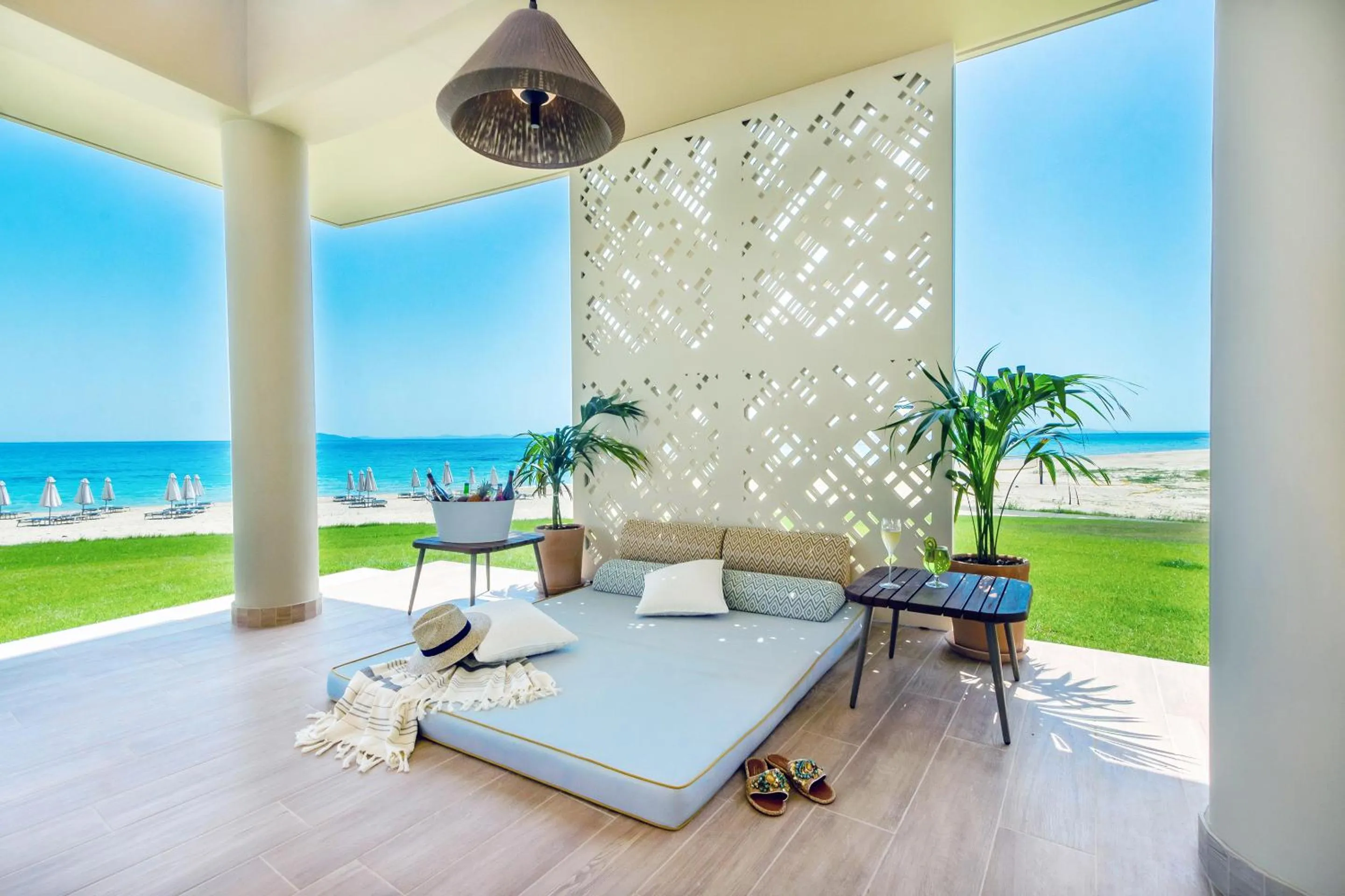 Seating area, Bed in Ammoa Luxury Hotel & Spa Resort