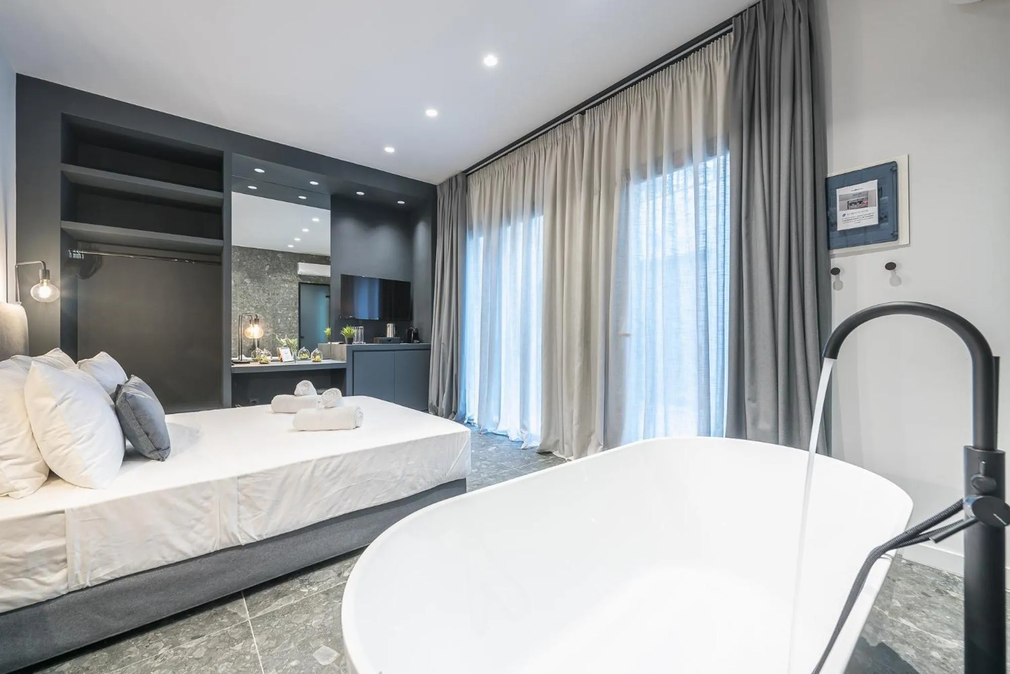 Bed in The Asprogeraka - self check-in rooms