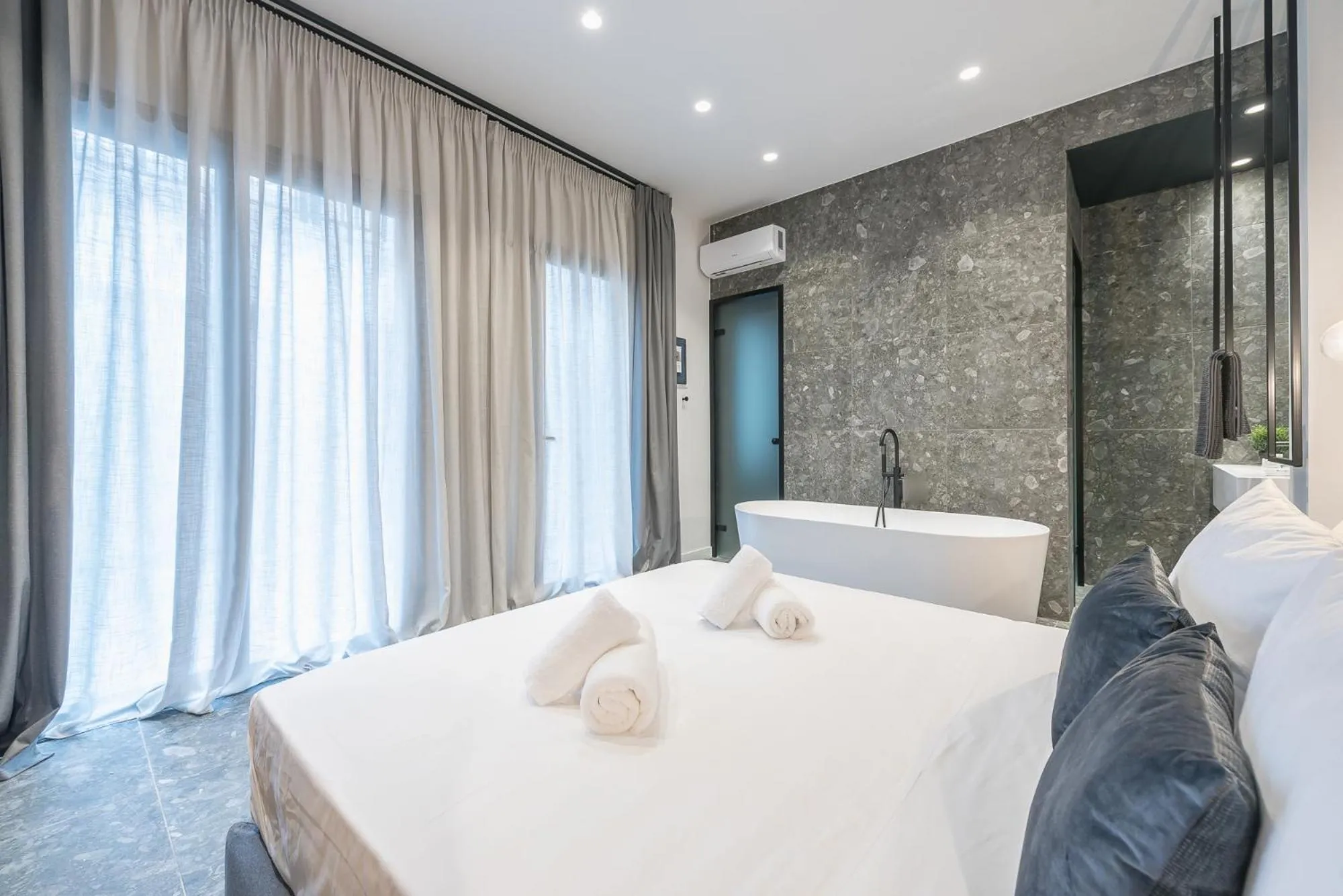 Bed in The Asprogeraka - self check-in rooms