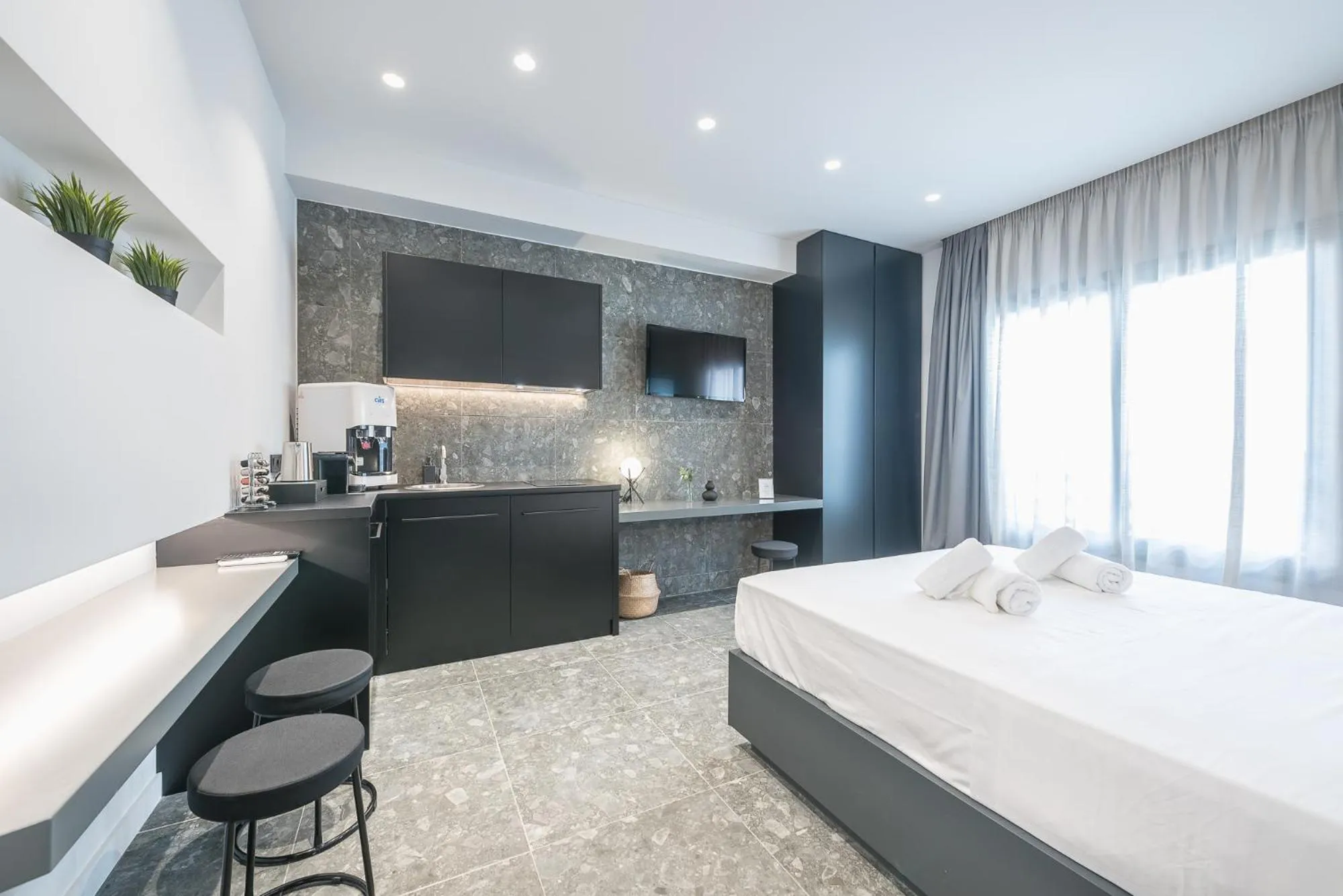 Bed in The Asprogeraka - self check-in rooms