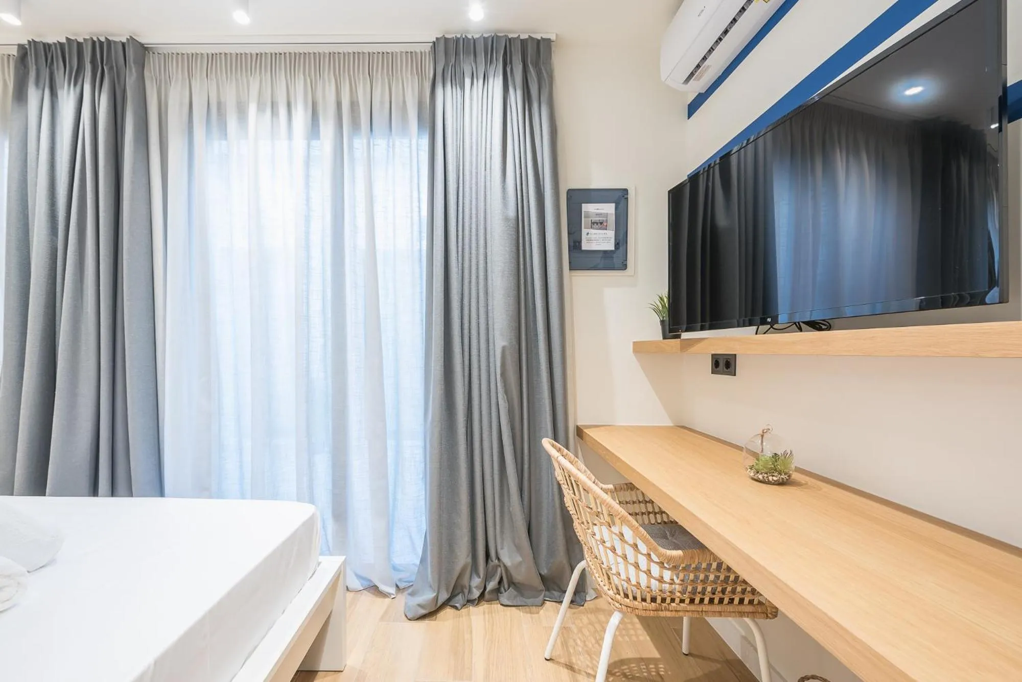 Bed in The Asprogeraka - self check-in rooms